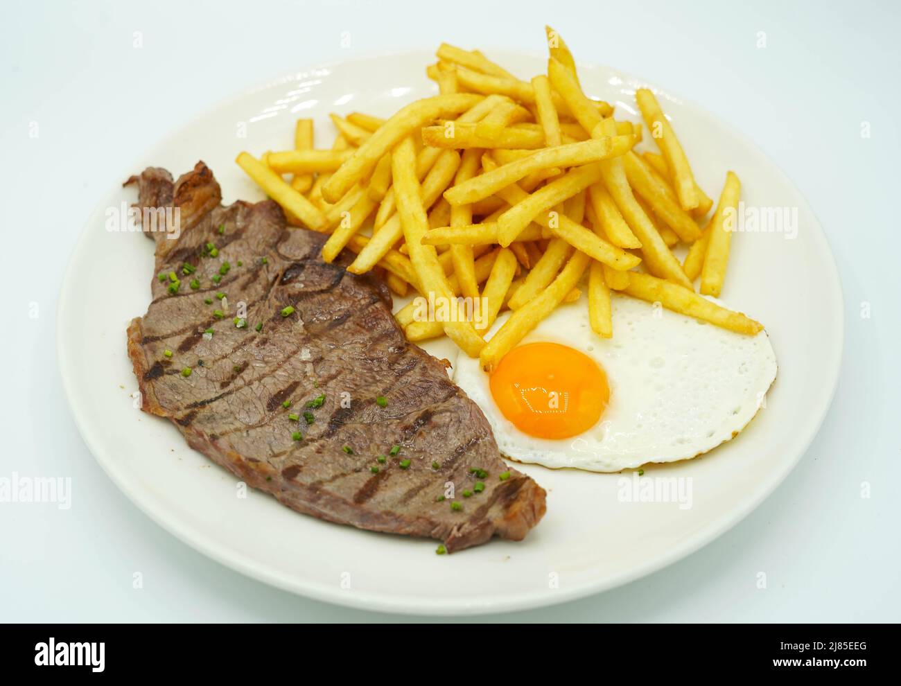 Assiette combinée de filet de porc avec pommes de terre et œuf frit Banque D'Images