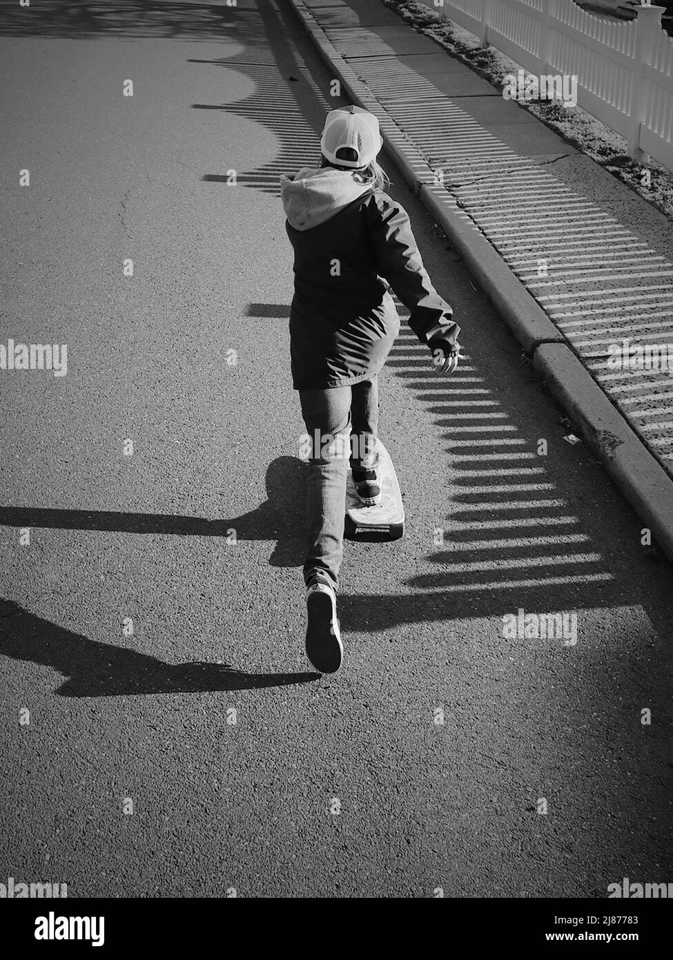 Skateboarder dans l'après-midi Banque D'Images