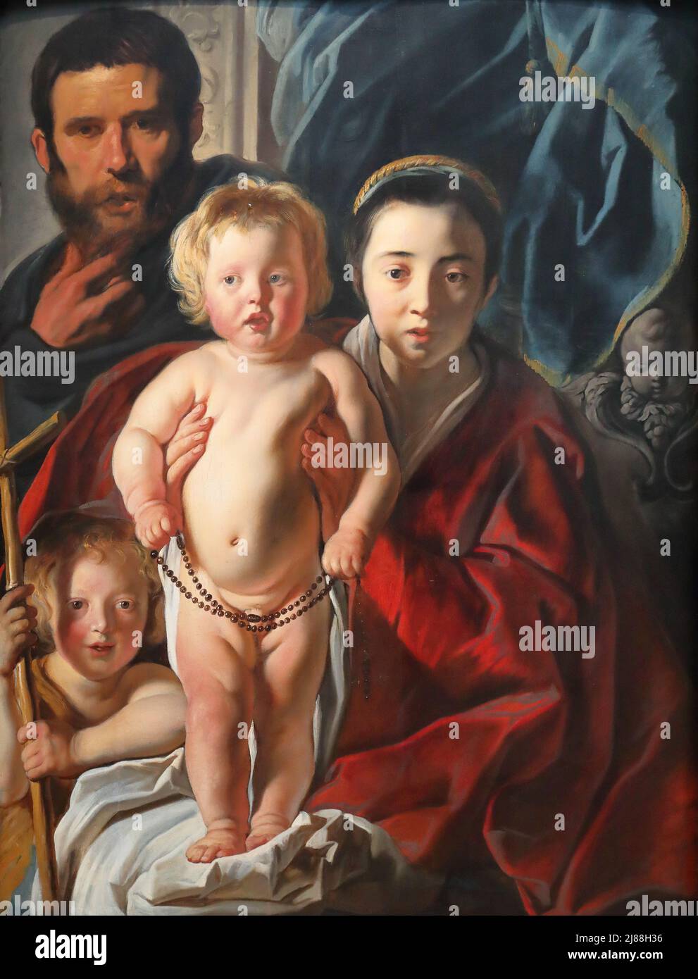 La Sainte famille et Saint Jean-Baptiste par le peintre flamand Jacob Jordaens à la National Gallery, Londres, Royaume-Uni Banque D'Images