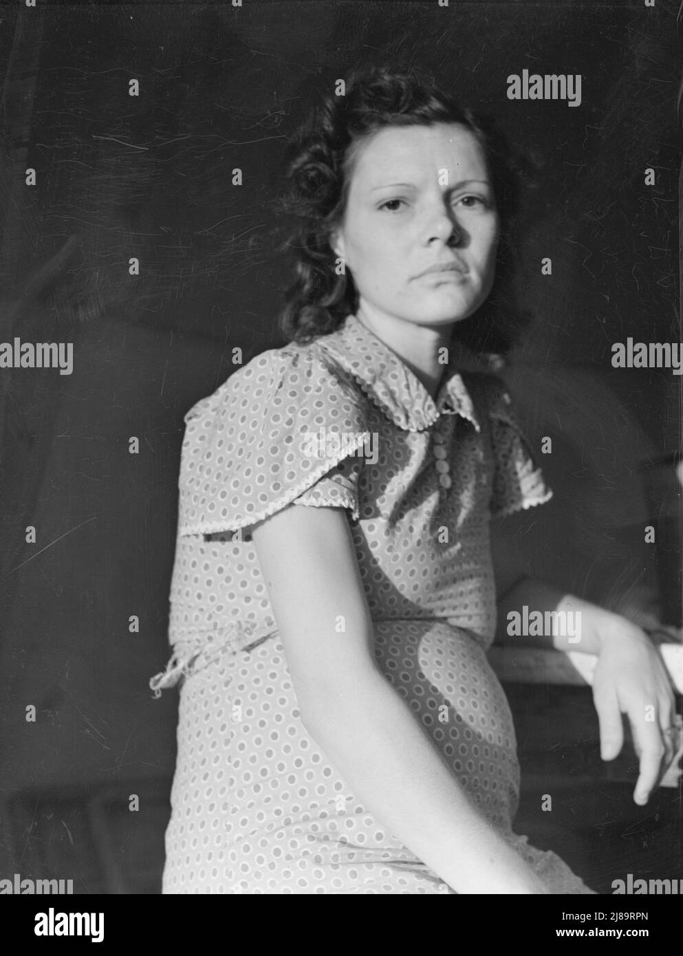 Femme enceinte, fille d'une famille de migrants. Imperial Valley, Californie. Banque D'Images