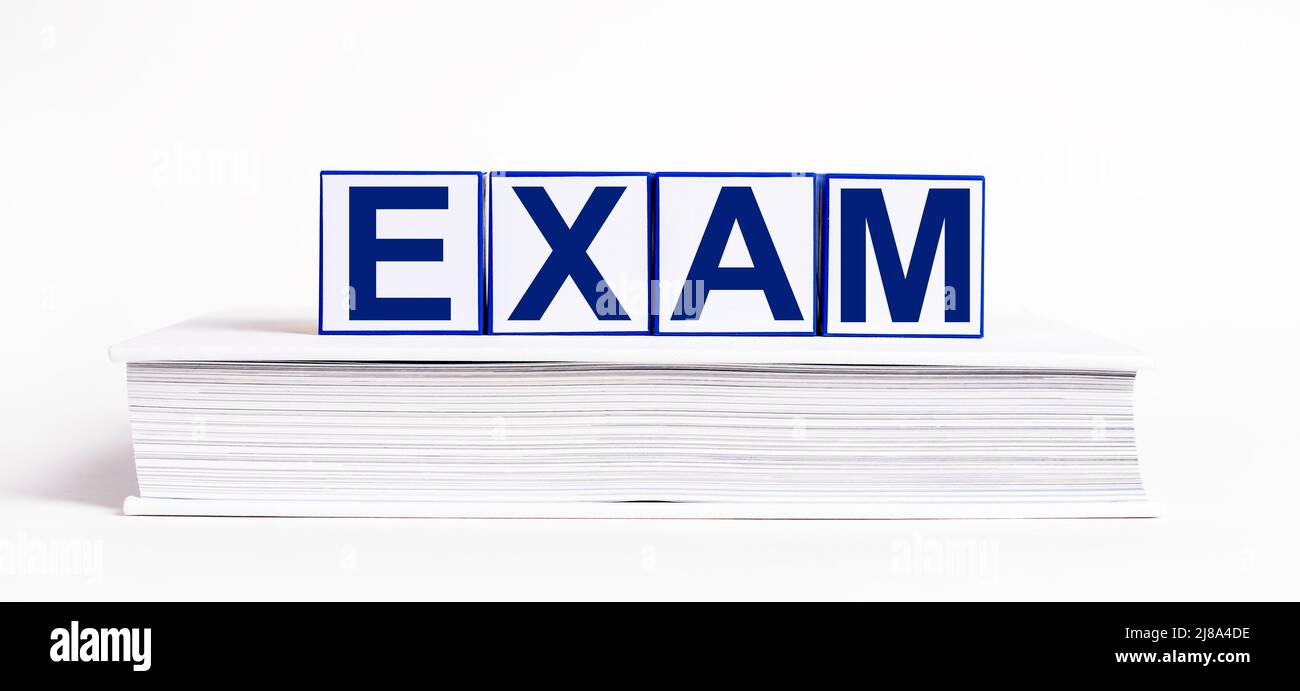 Examen, mot sur livre fermé, copybook. Photo de haute qualité Banque D'Images