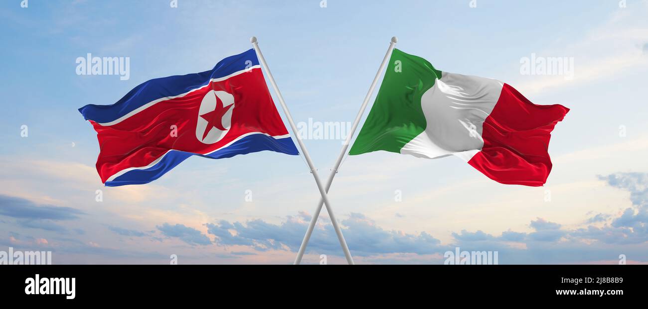 Deux drapeaux croisés la Corée du Nord et l'Italie agitant sous le vent à ciel nuageux. Concept de relation, de dialogue, de voyage entre deux pays. 3d illustrat Banque D'Images