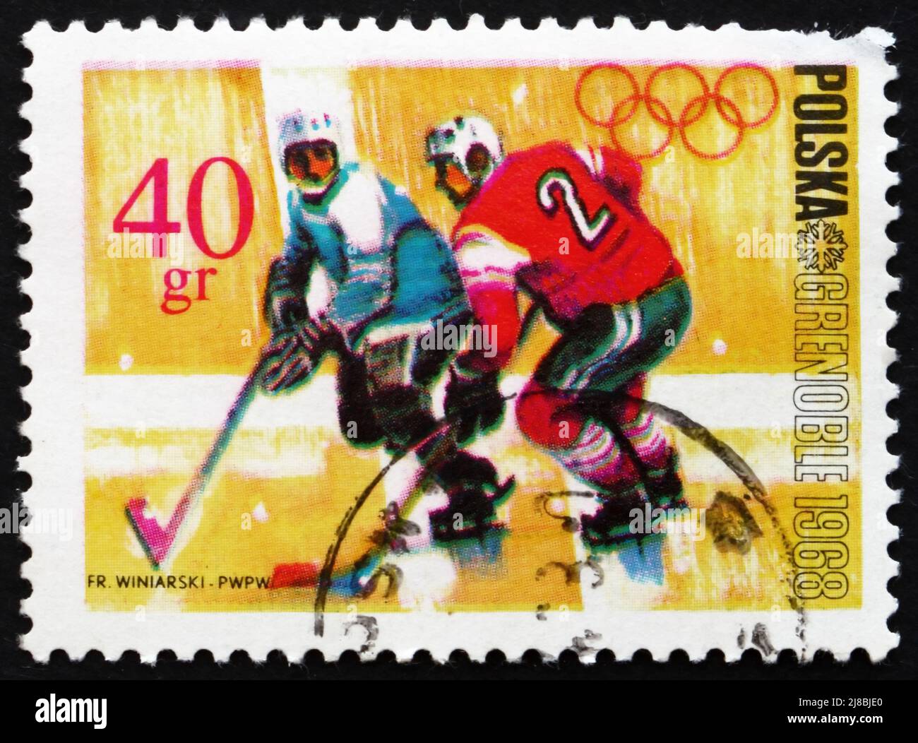 POLOGNE - VERS 1968 : un timbre imprimé en Pologne montre Hockey sur glace, sports olympiques d'hiver, Grenoble 68, vers 1968 Banque D'Images
