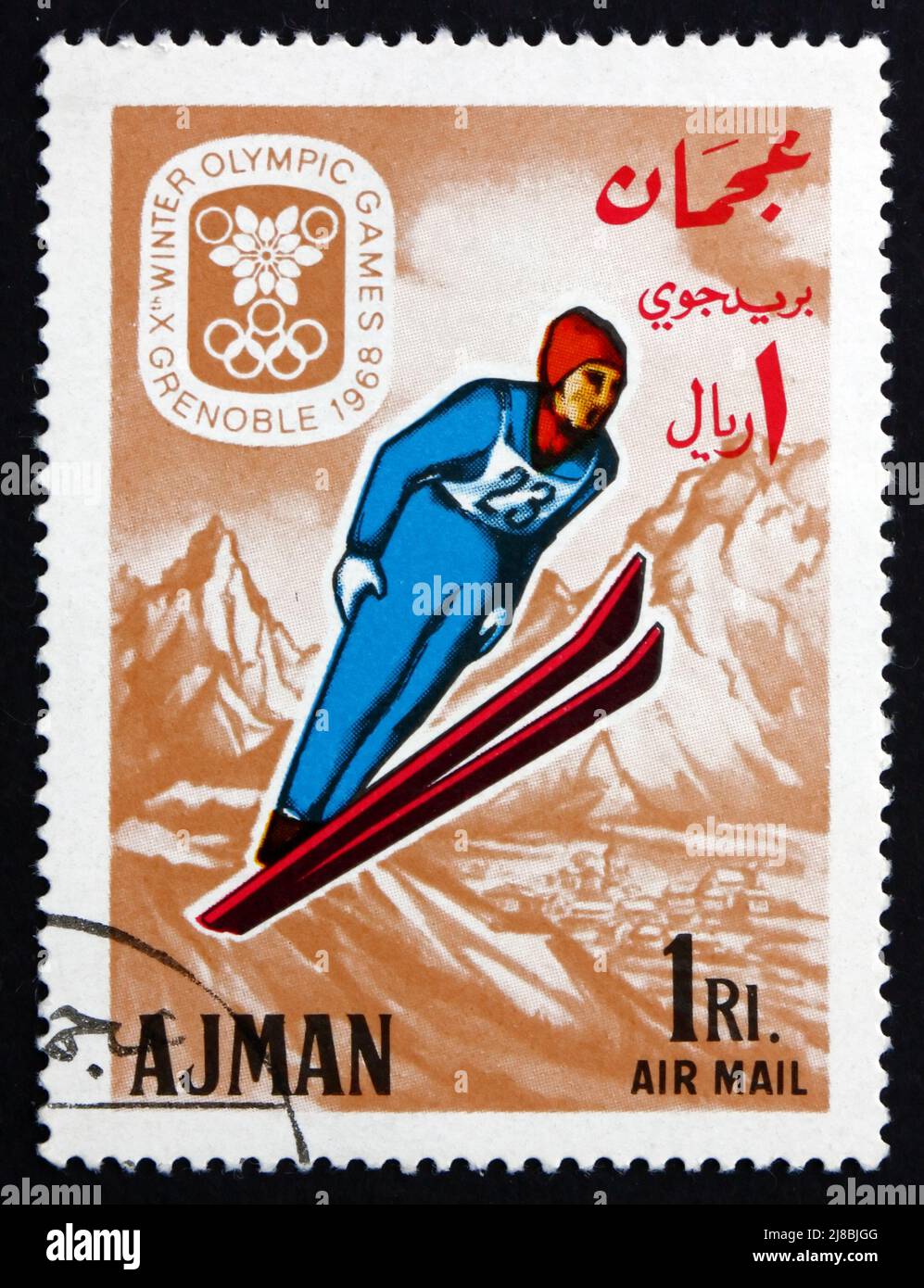 AJMAN - VERS 1967 : un timbre imprimé dans l'Ajman montre le saut à ski, Jeux Olympiques d'hiver 68, Grenoble, vers 1967 Banque D'Images