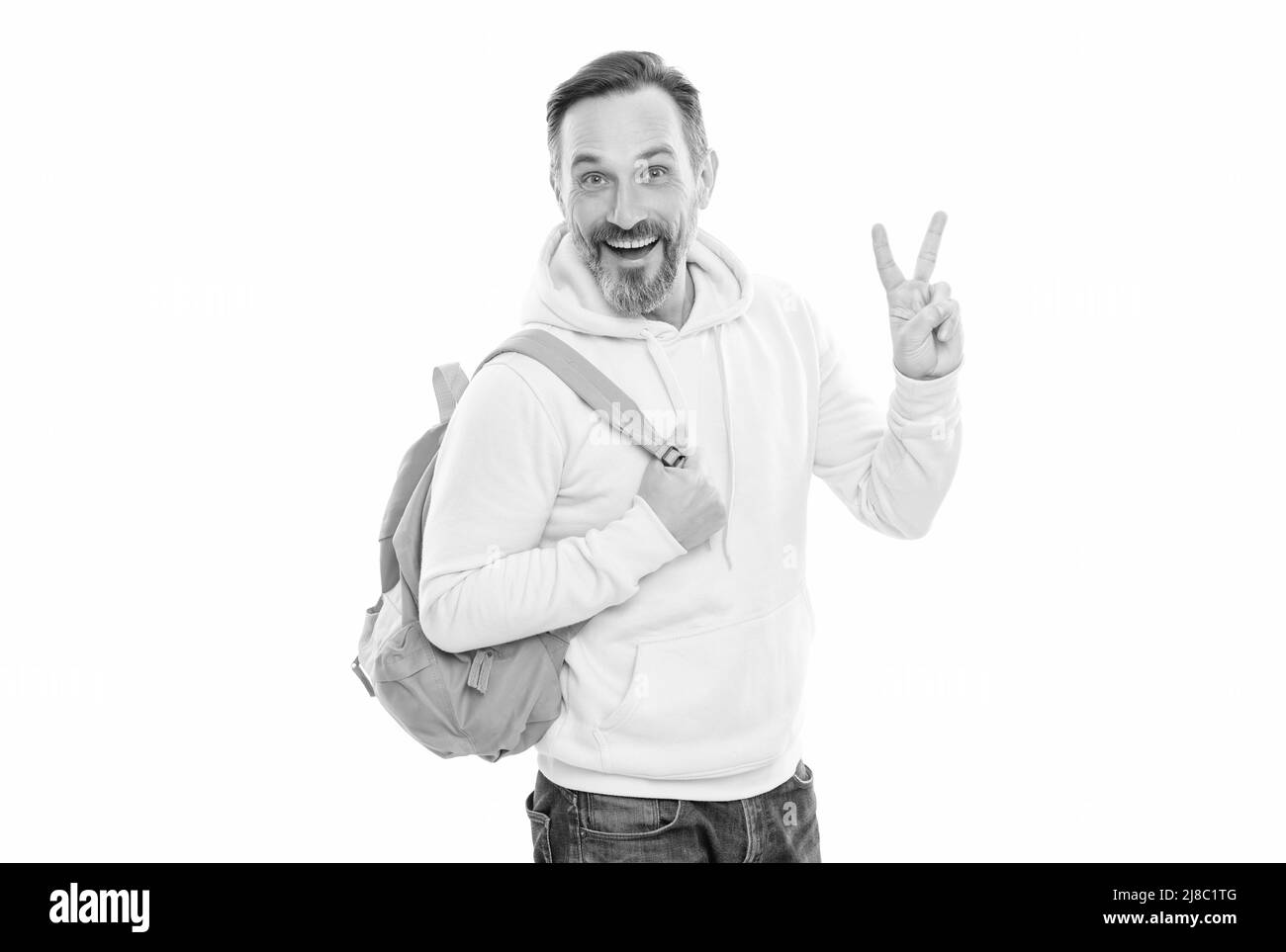 éducation pour adulte. style décontracté pour homme. geste de paix. homme heureux et mature avec sac à dos pour le transport de la barbe. Banque D'Images