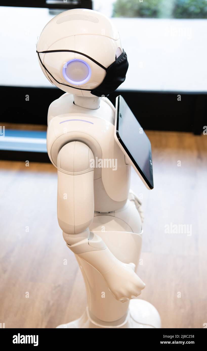 assistant robot futuriste technologie innovante dans le masque de protection Banque D'Images