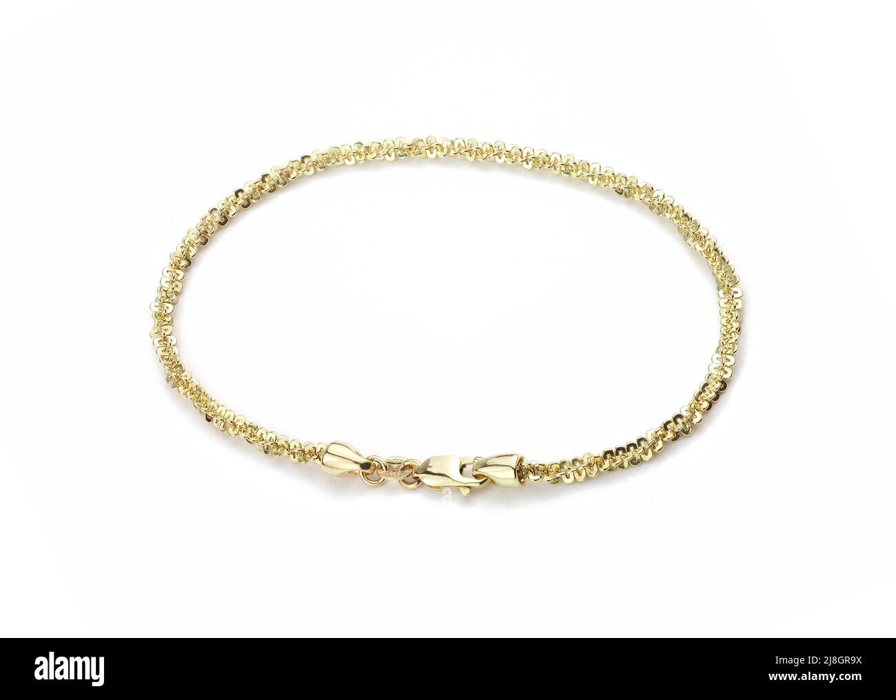 Bracelet pour femmes en or sur fond blanc Banque D'Images