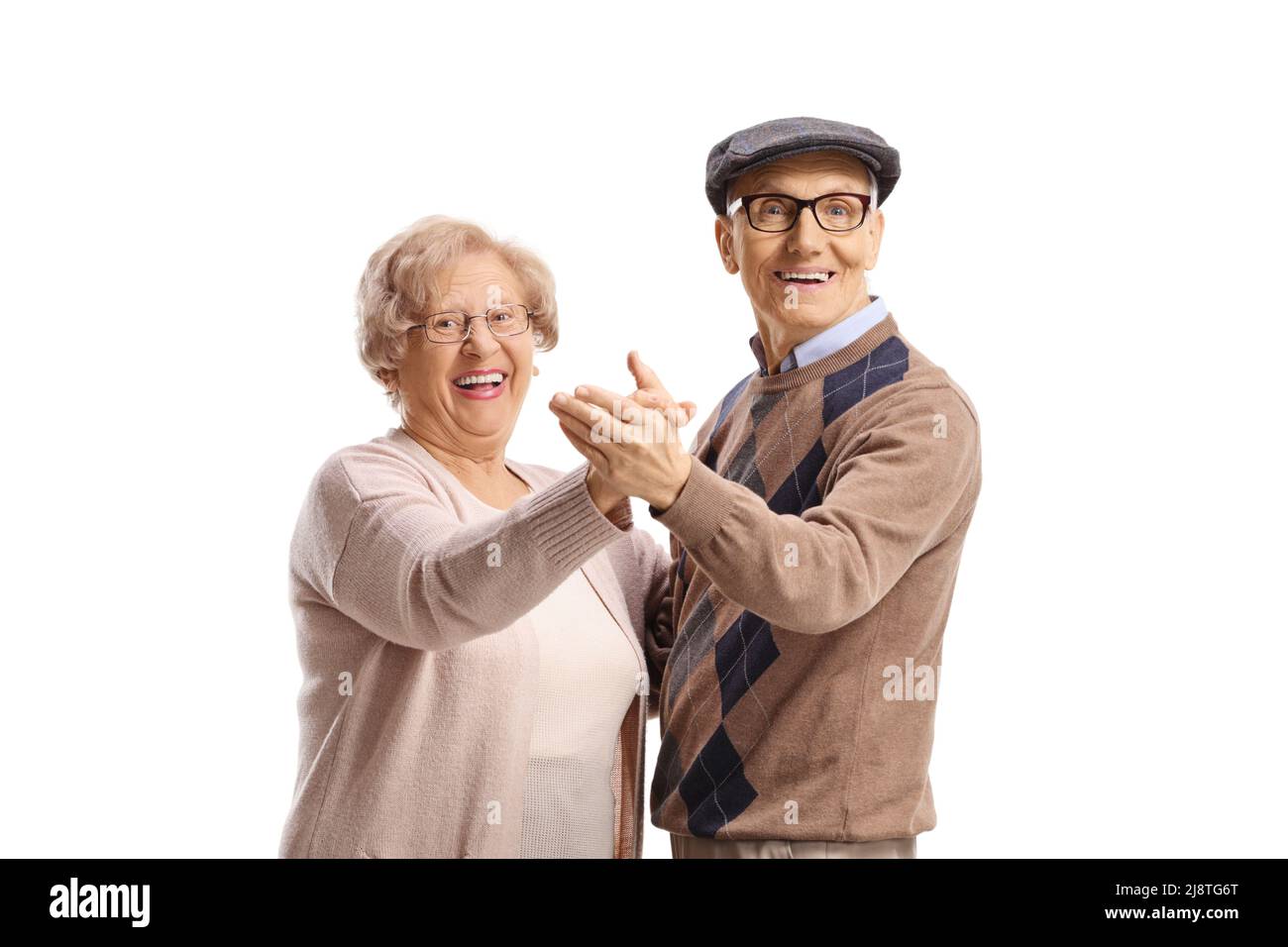 Joyeux homme âgé et femme dansant le tango isolé sur fond blanc Banque D'Images