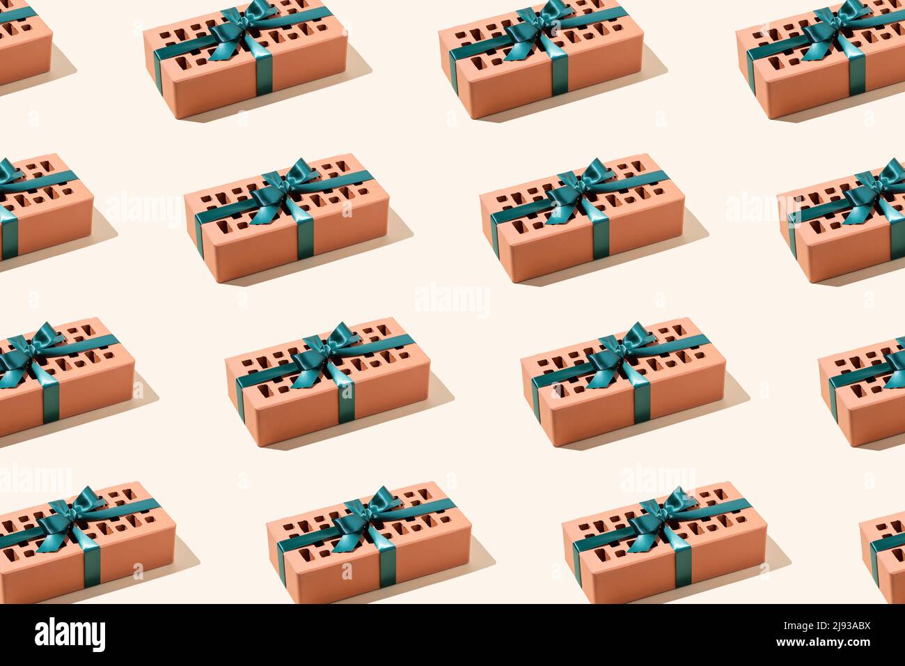 Motif composé de briques en céramique et de rubans verts attachés. Image conceptuelle. Banque D'Images