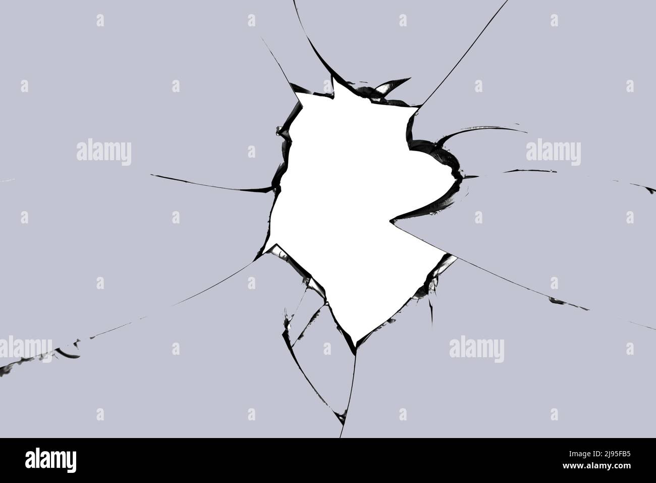 Trou de verre cassé. Photo de fissures sur la vitre. Texture pour le design. Banque D'Images