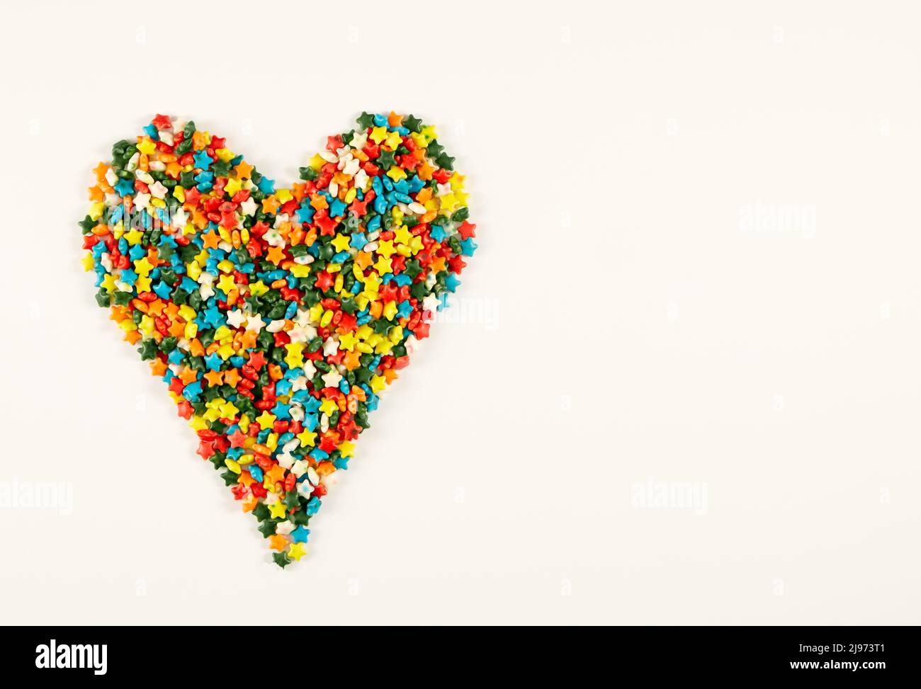 Forme de cœur colorée de différentes arrosettes multicolores Banque D'Images