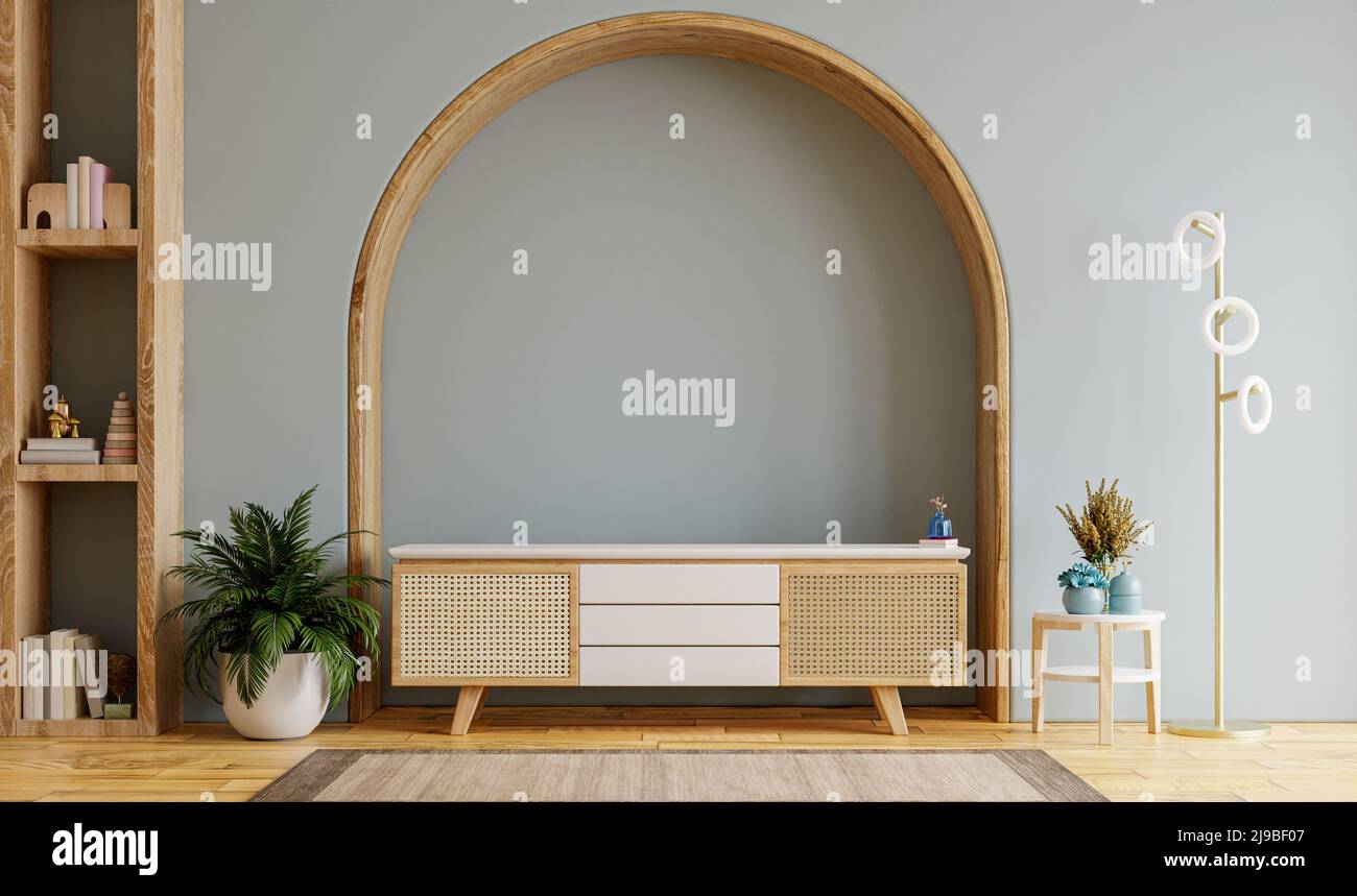 Armoire en bois pour TV LED dans un salon vide intérieur avec mur bleu foncé.3D rendu Banque D'Images