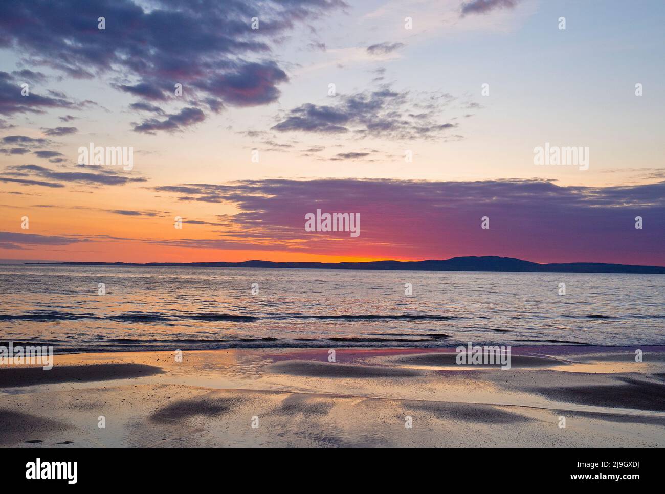 Coucher de soleil sur la plage de Kintra, Islay, Inner Hebrides, Écosse Banque D'Images