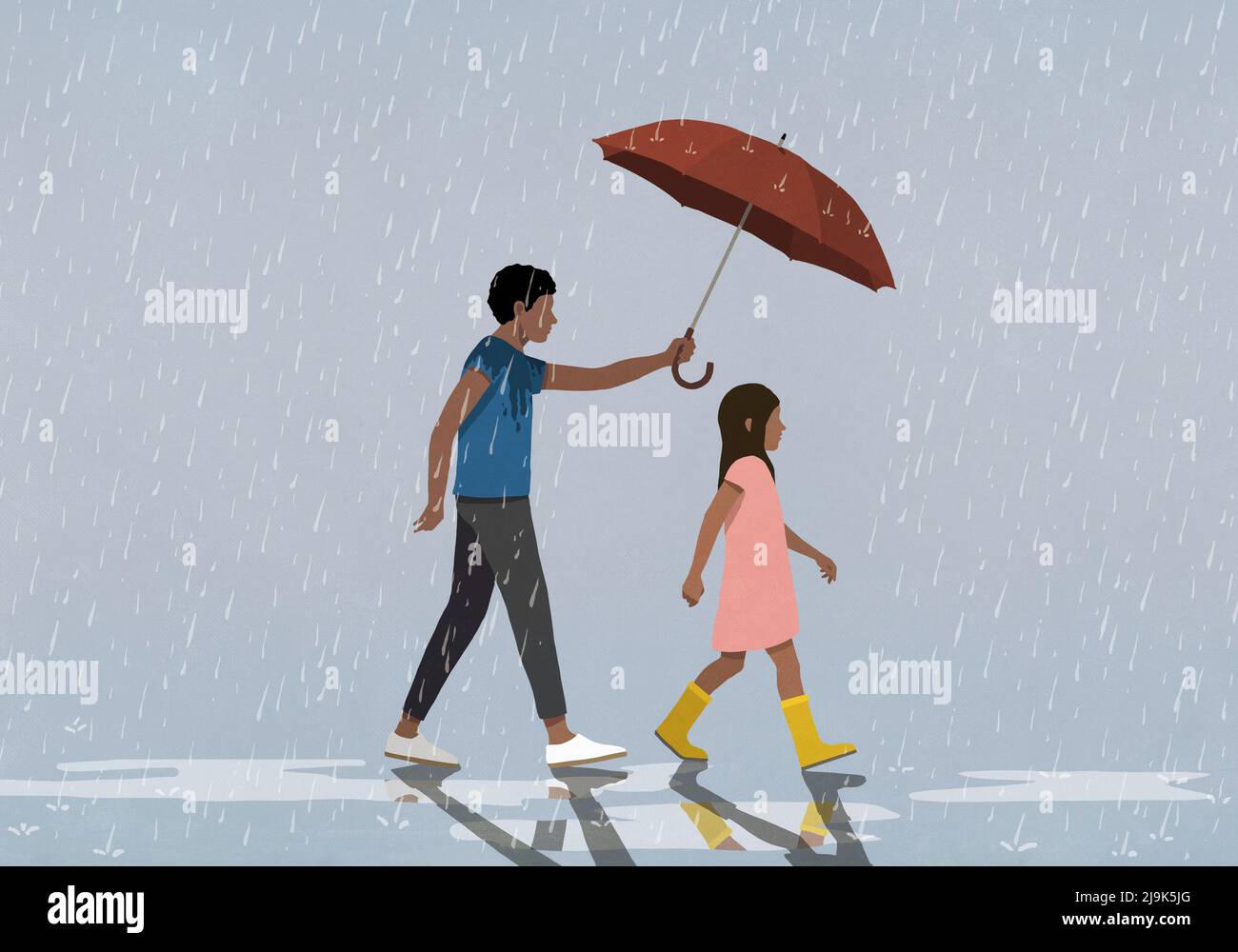 Père tenant un parapluie sur sa fille marchant sous la pluie Banque D'Images