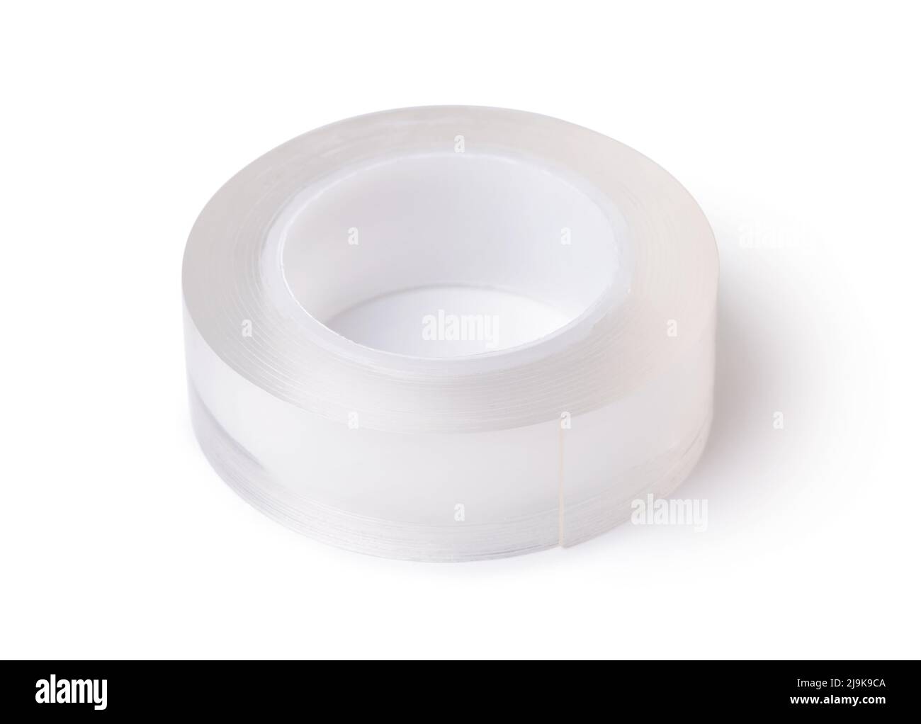 Rouleau de ruban adhésif double face transparent en silicone isolé sur blanc Banque D'Images