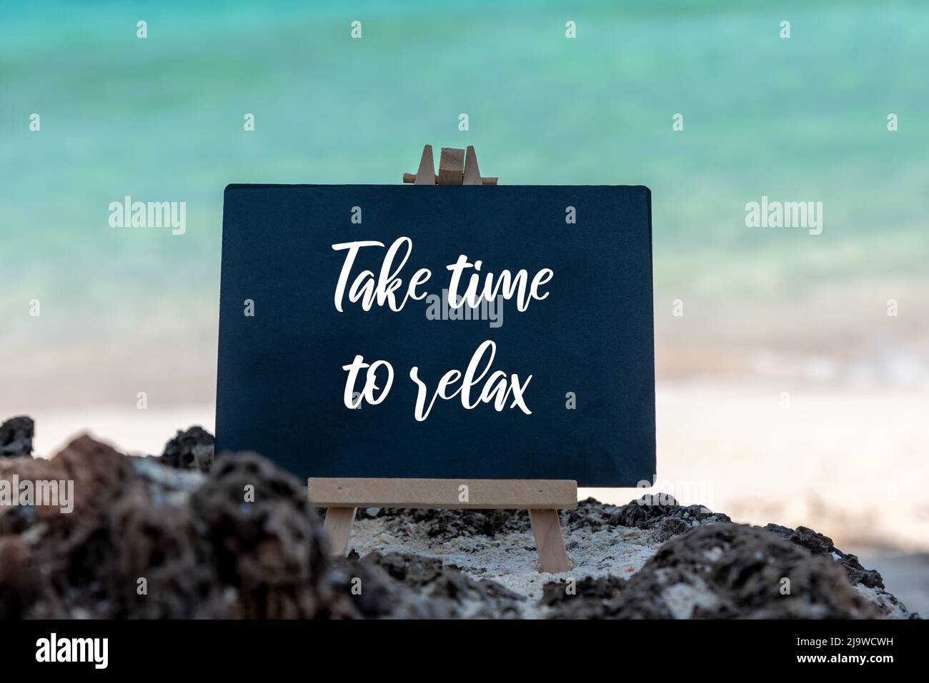 Citations inspirantes - prenez le temps de vous détendre sur la plage Banque D'Images