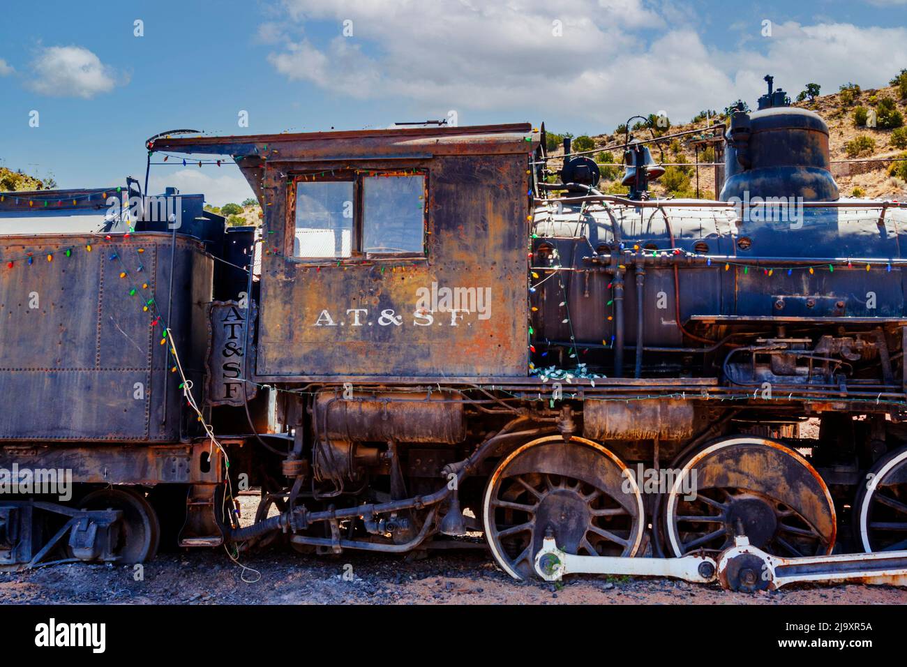 Madrid Nouveau-Mexique vieux rouillé vieux train de machine à vapeur de retour comme un musée de l'Ouest ancien. Banque D'Images