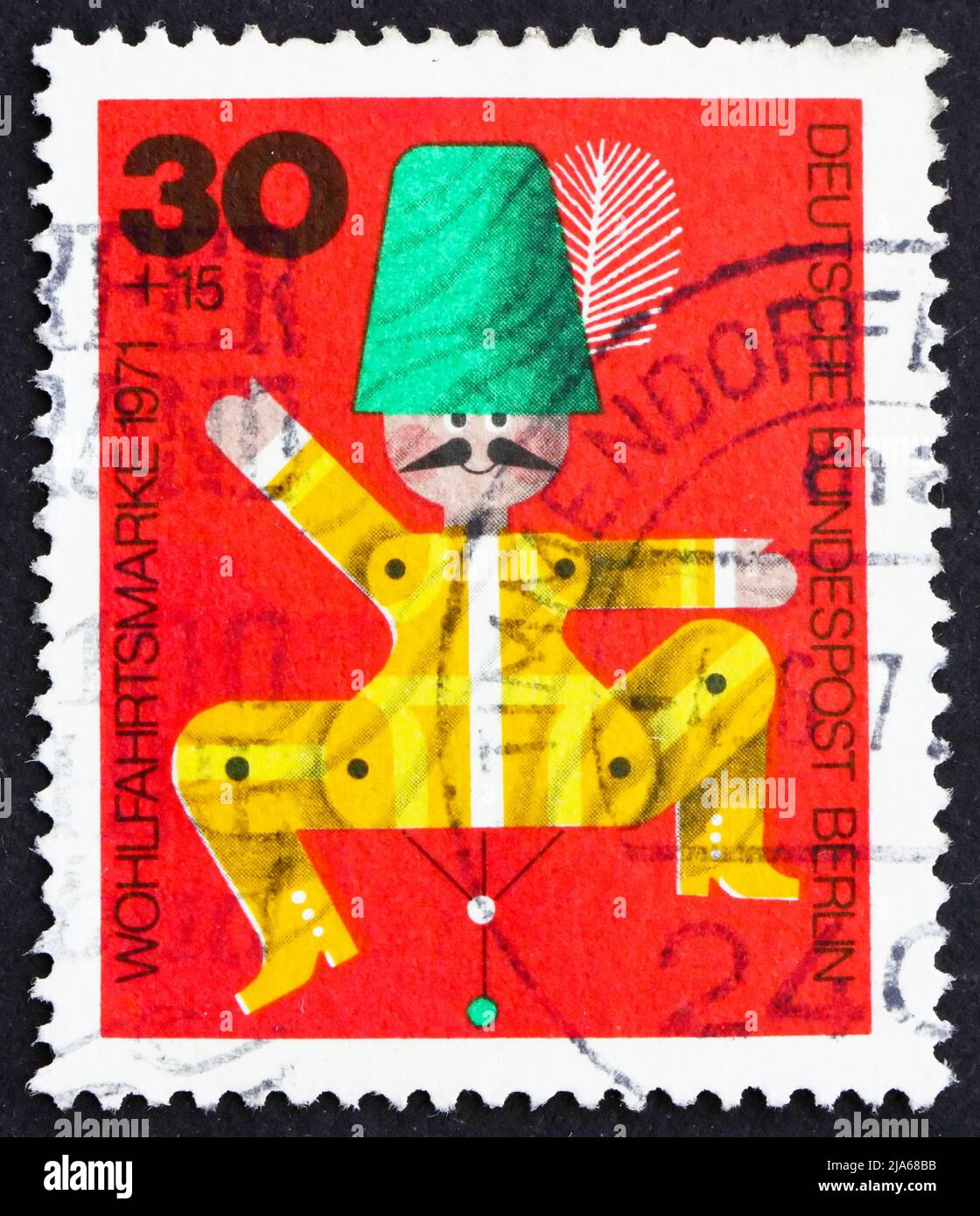 ALLEMAGNE - VERS 1971: Un timbre imprimé en Allemagne, Berlin montre Jumping Jack, Wooden Toy, vers 1971 Banque D'Images