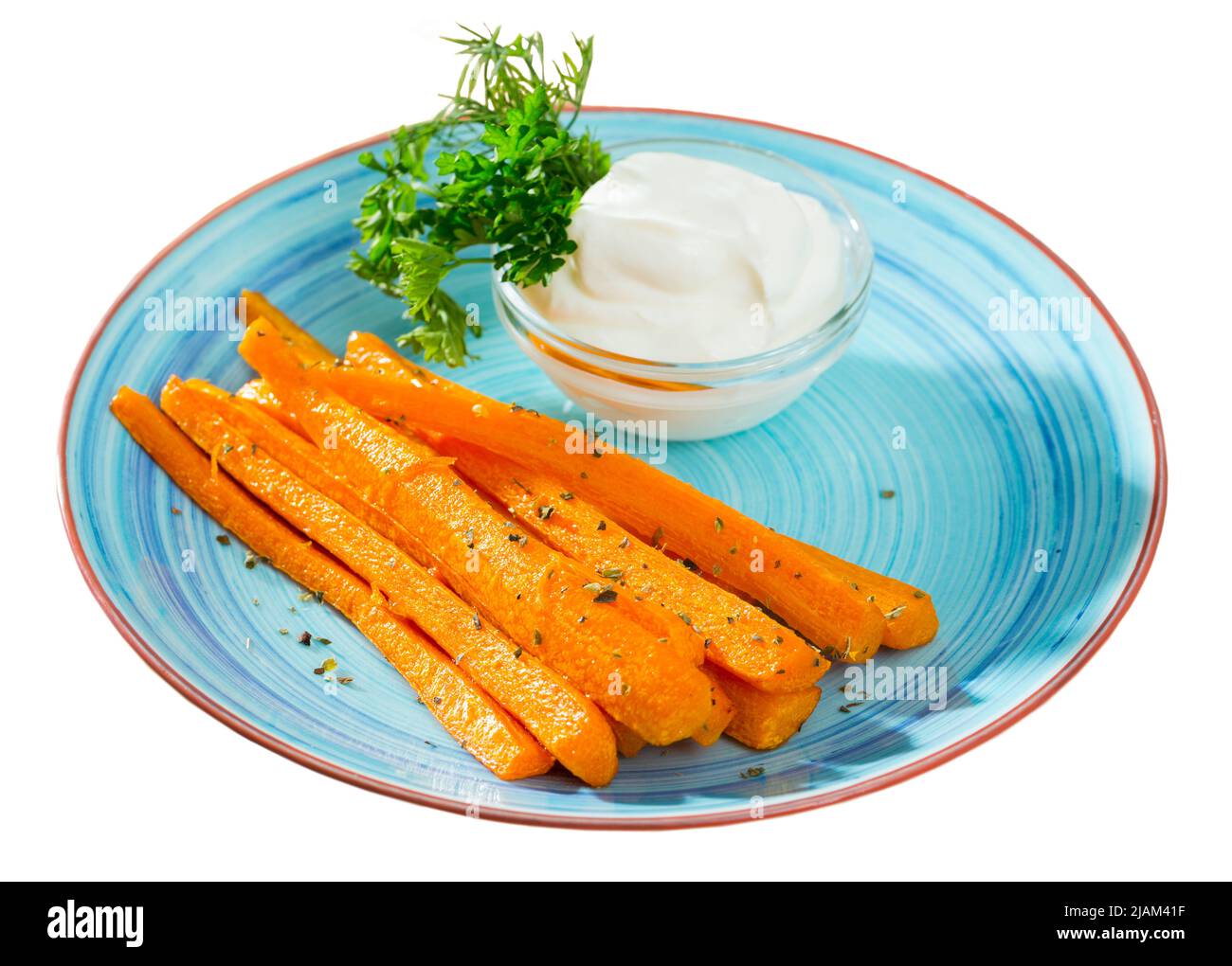 Bâtonnets de carottes trempés à la crème Banque D'Images