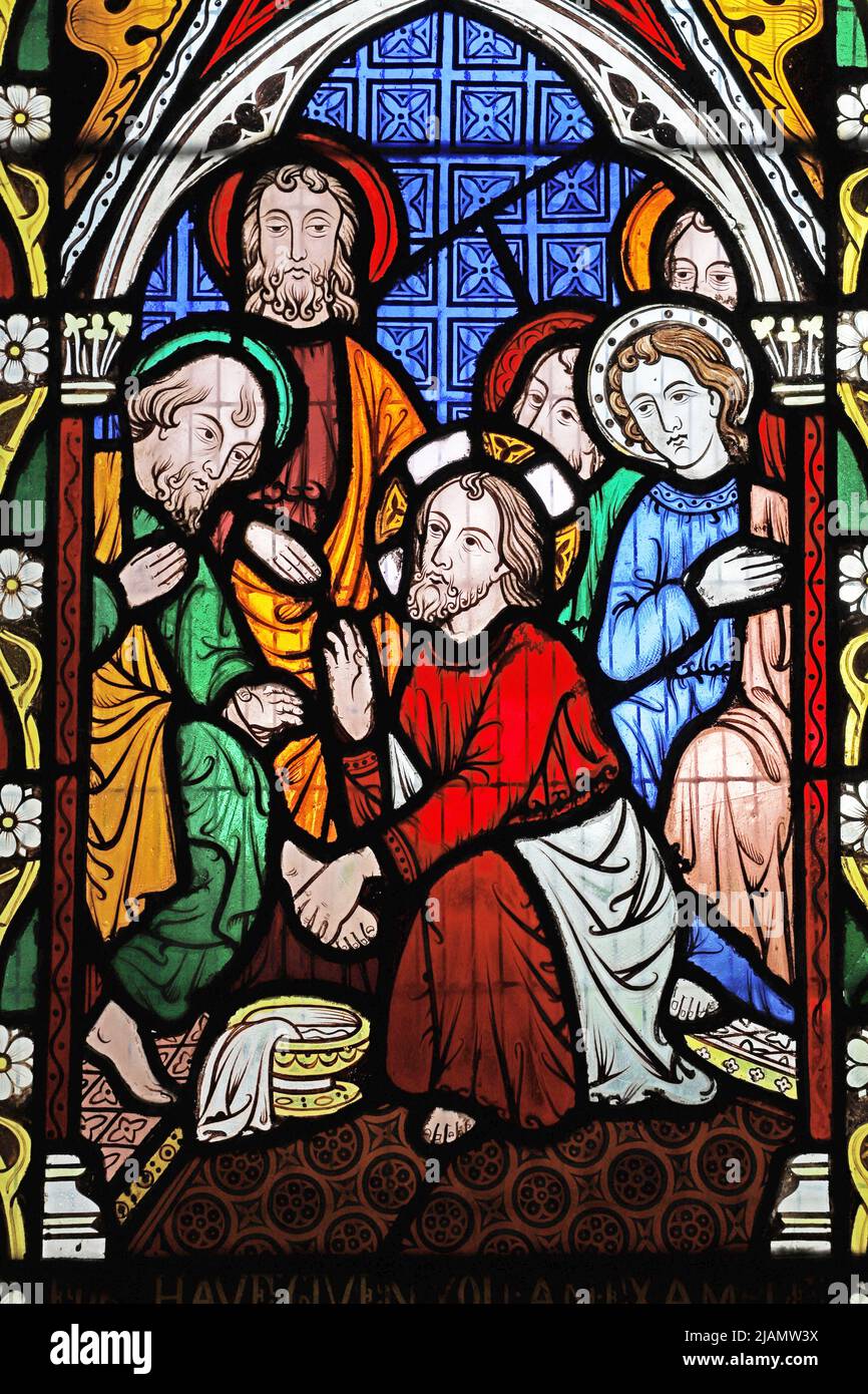 Un vitrail de Frederick Preedy représentant Jésus lavant les pieds du disciple, l'église de la Toussaint, l'église de Lench, Worcestershire Banque D'Images