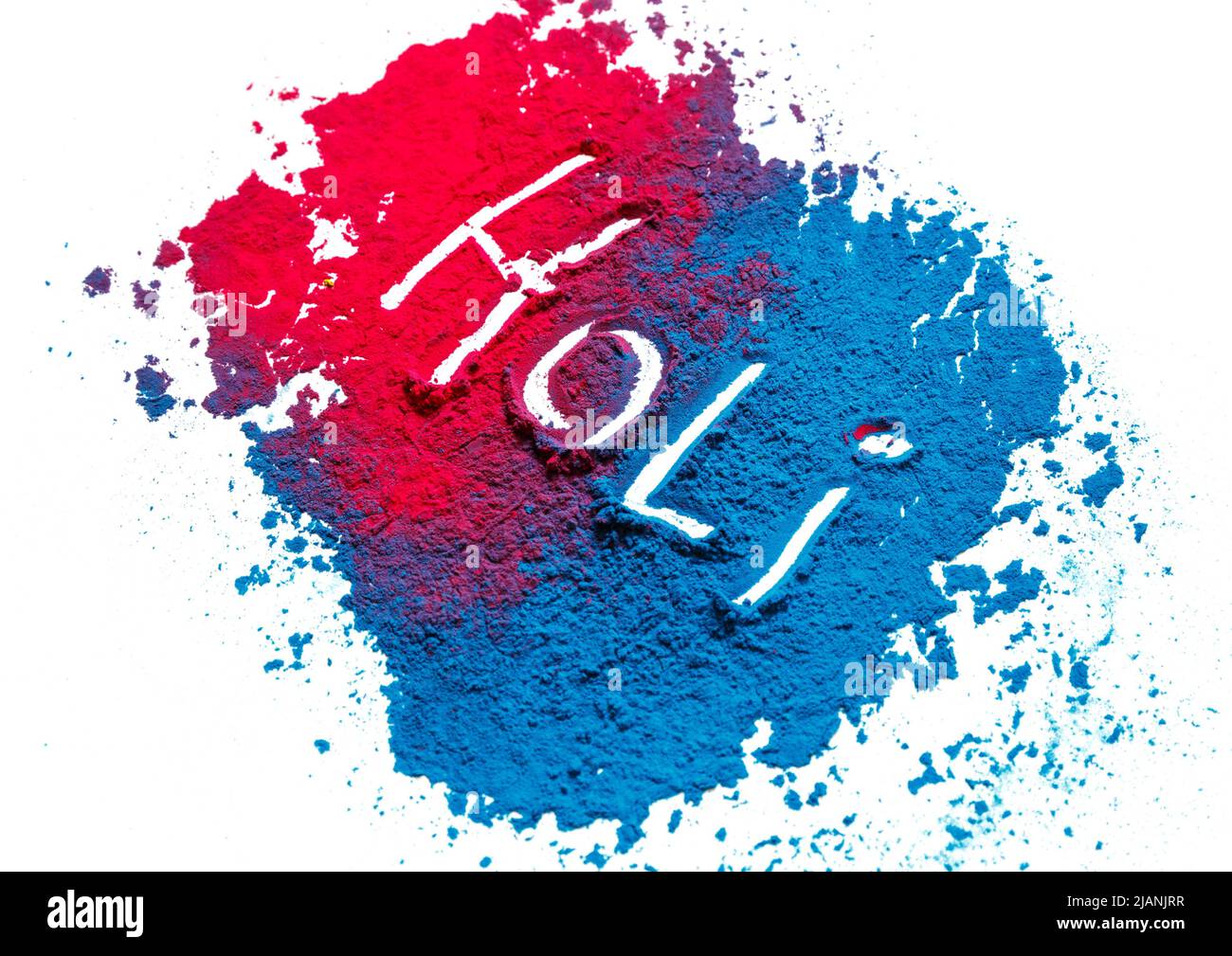 Résumé coloré Happy Holi fond. Poudre vive de couleur isolée sur blanc. Texture de la poussière. Banque D'Images