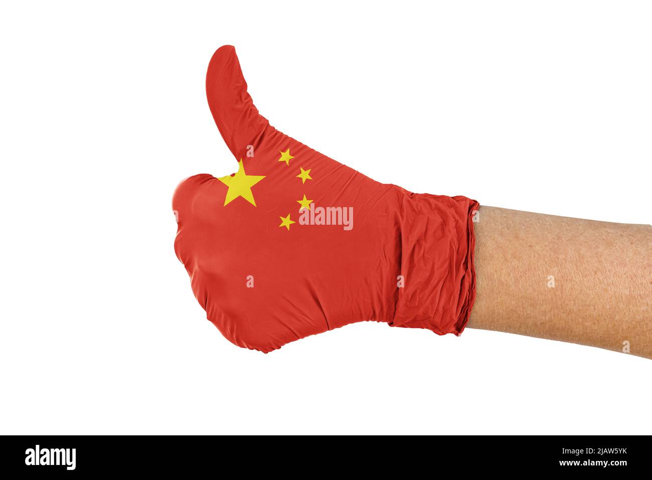 Drapeau chinois sur un gant médical montrant un signe de pouce vers le haut Banque D'Images Drapeau chinois sur un gant médical montrant un signe de pouce vers le haut Banque D'Images