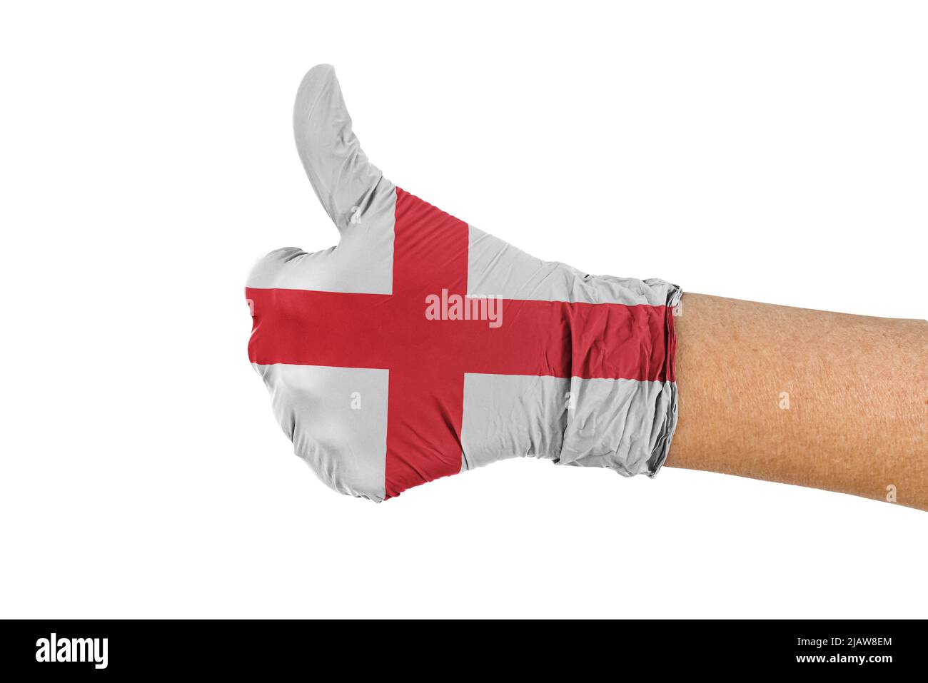Drapeau de l'Angleterre sur un gant médical montrant un signe de pouce vers le haut Banque D'Images Drapeau de l'Angleterre sur un gant médical montrant un signe de pouce vers le haut Banque D'Images