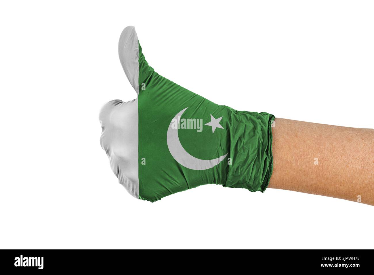 Drapeau pakistanais sur un gant médical montrant un signe de pouce levé Banque D'Images Drapeau pakistanais sur un gant médical montrant un signe de pouce levé Banque D'Images