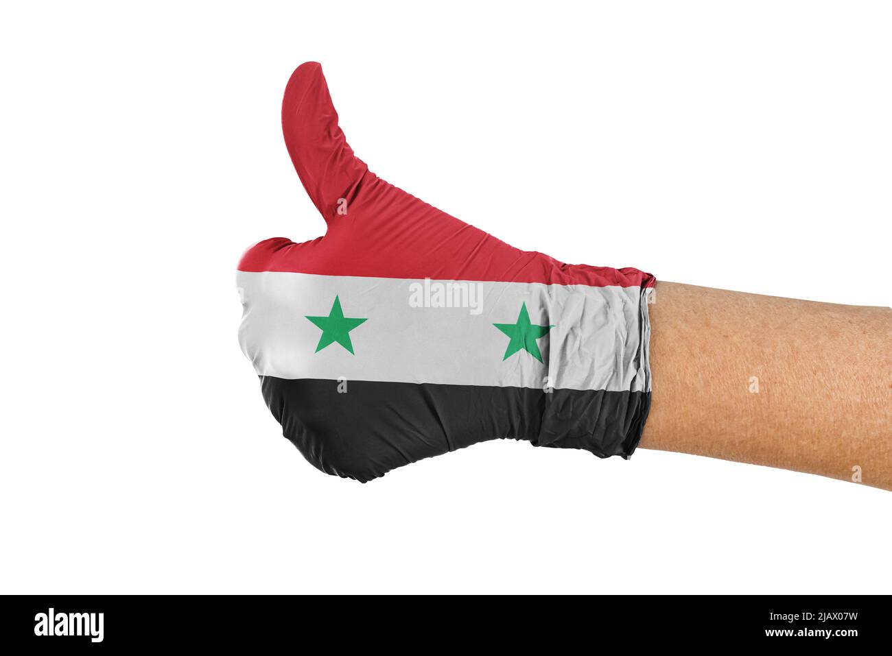 Drapeau de la Syrie sur un gant médical montrant le signe du pouce vers le haut Banque D'Images Drapeau de la Syrie sur un gant médical montrant le signe du pouce vers le haut Banque D'Images