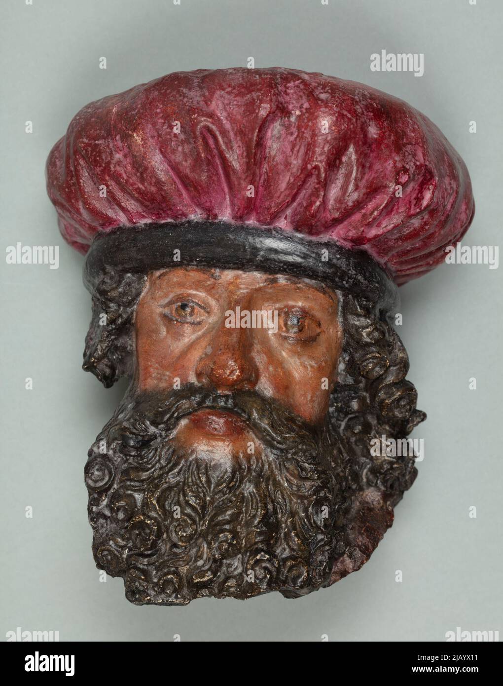 Tête mâle avec cheveux bouclés, barbe et moustache, avec un chapeau – plâtre de la sculpture de Veit Stoss de l'autel de l'église Sainte Marie. Unknown, Stwosz, Wit (vers 1447 1533) Banque D'Images