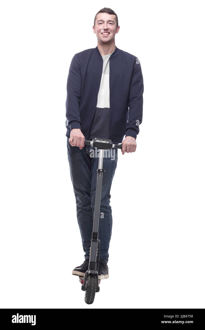 jeune homme souriant avec un scooter électrique . Banque D'Images