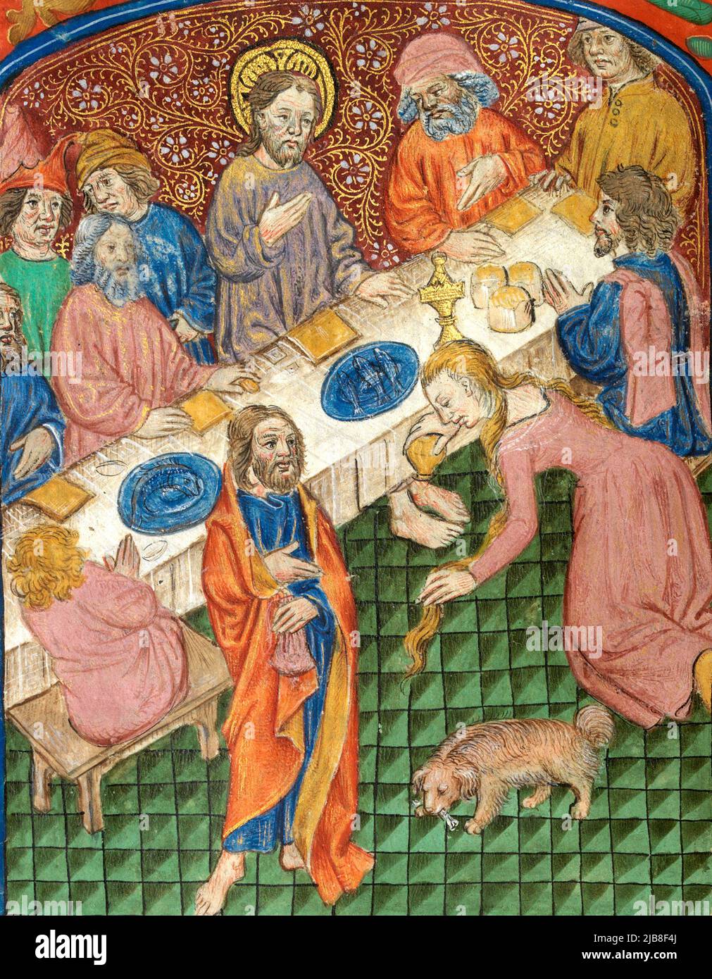 Mary Magdalen ontant les pieds du Christ d'un manuscrit illuminé de 15th siècles. Banque D'Images