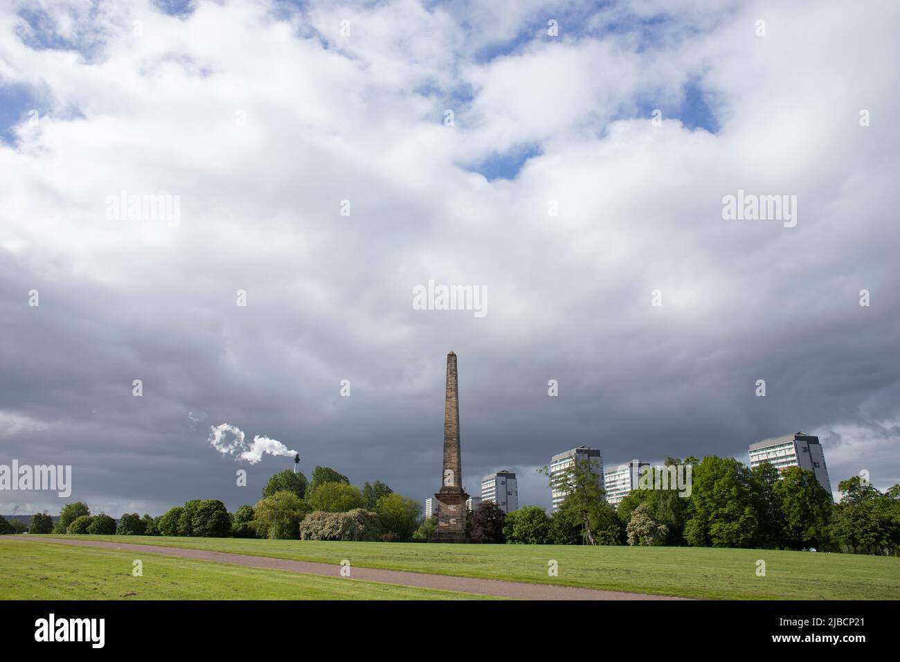 Le monument Nelson, vu de l'autre côté du parc à Glasgow Green, Glasgow, Écosse. Banque D'Images
