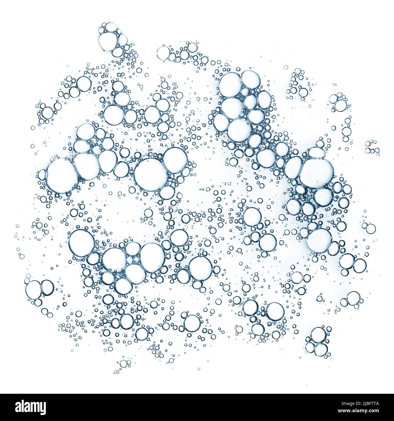 Bulles d'air dans le sérum liquide macro isolée sur fond blanc vue de dessus Banque D'Images