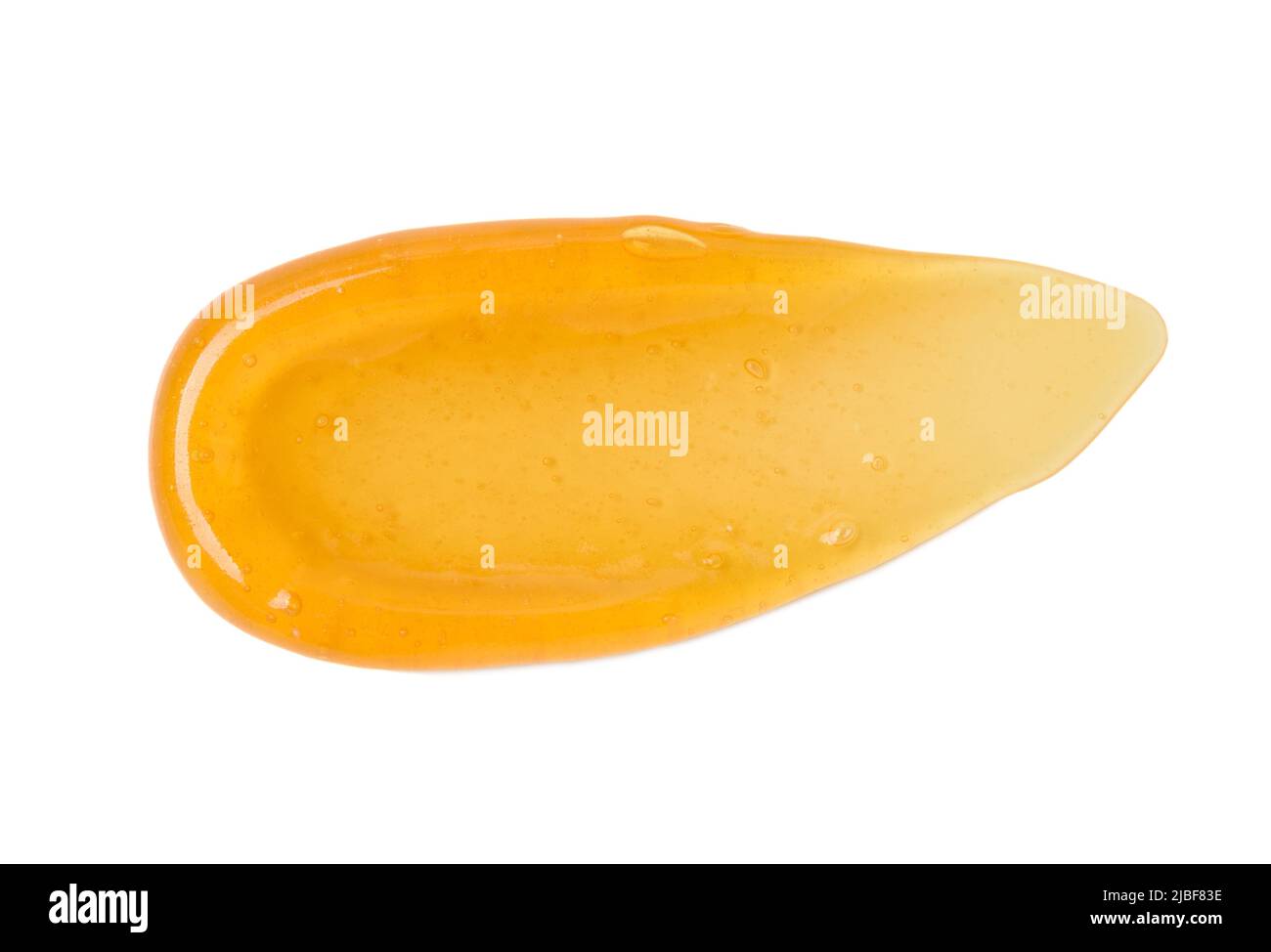 Frottis de gel transparent orange avec bulles isolées sur fond blanc vue de dessus Banque D'Images