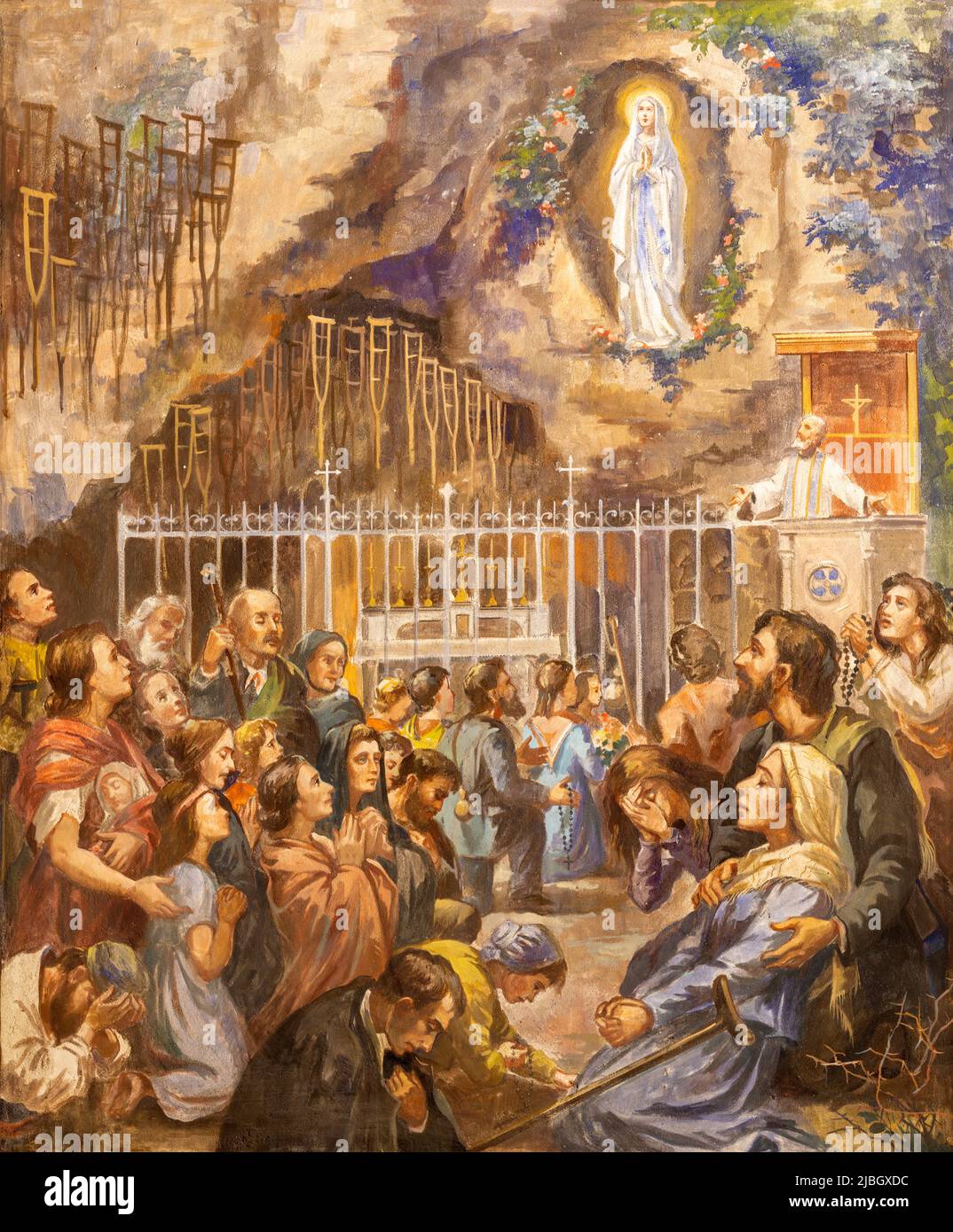 BARI, ITALIE - 3 MARS 2022 : la fresque de prière et de miracles à Lourdes dans l'église Chiesa di San Giuseppe par Umberto Colonna forme 20. Cent. Banque D'Images