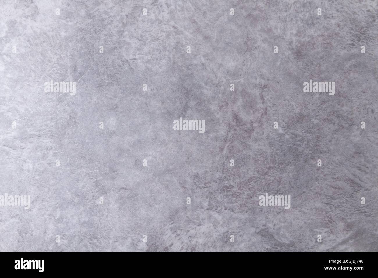 La texture du mur de pierre.petites fissures sur le mur de béton. Banque D'Images