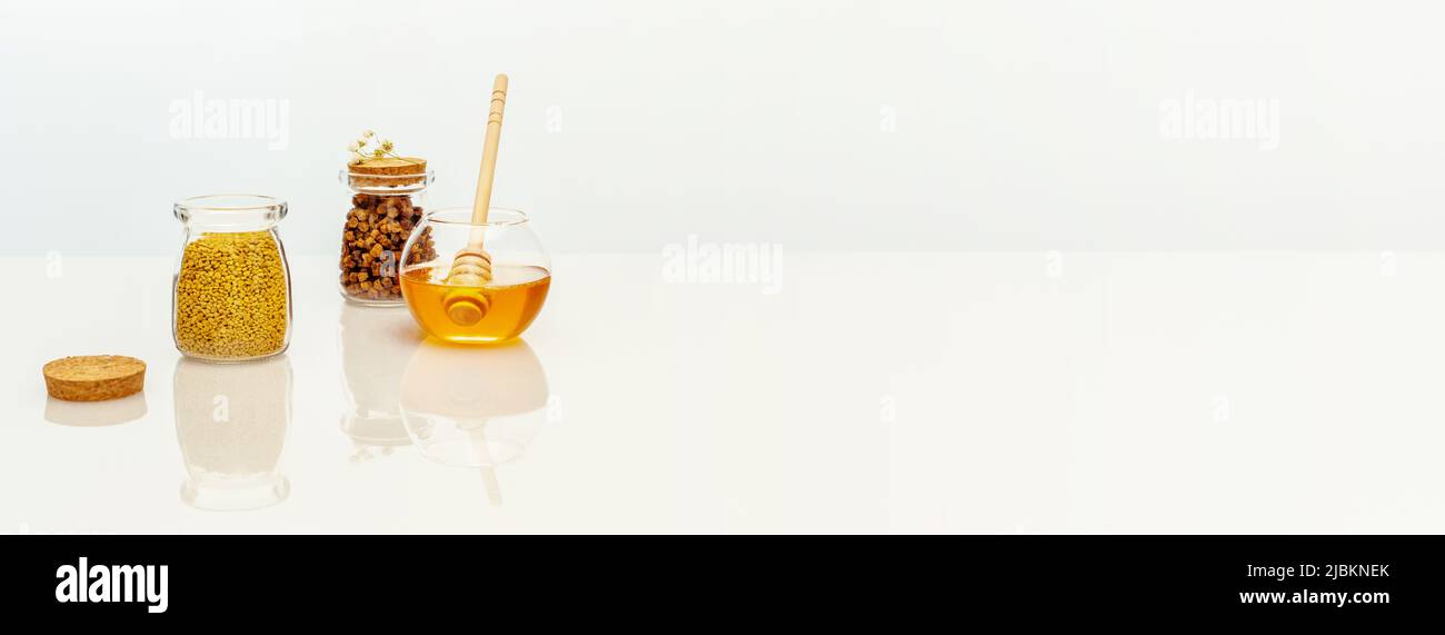 Produits d'abeille et bannière de miel avec propolis et miel Banque D'Images