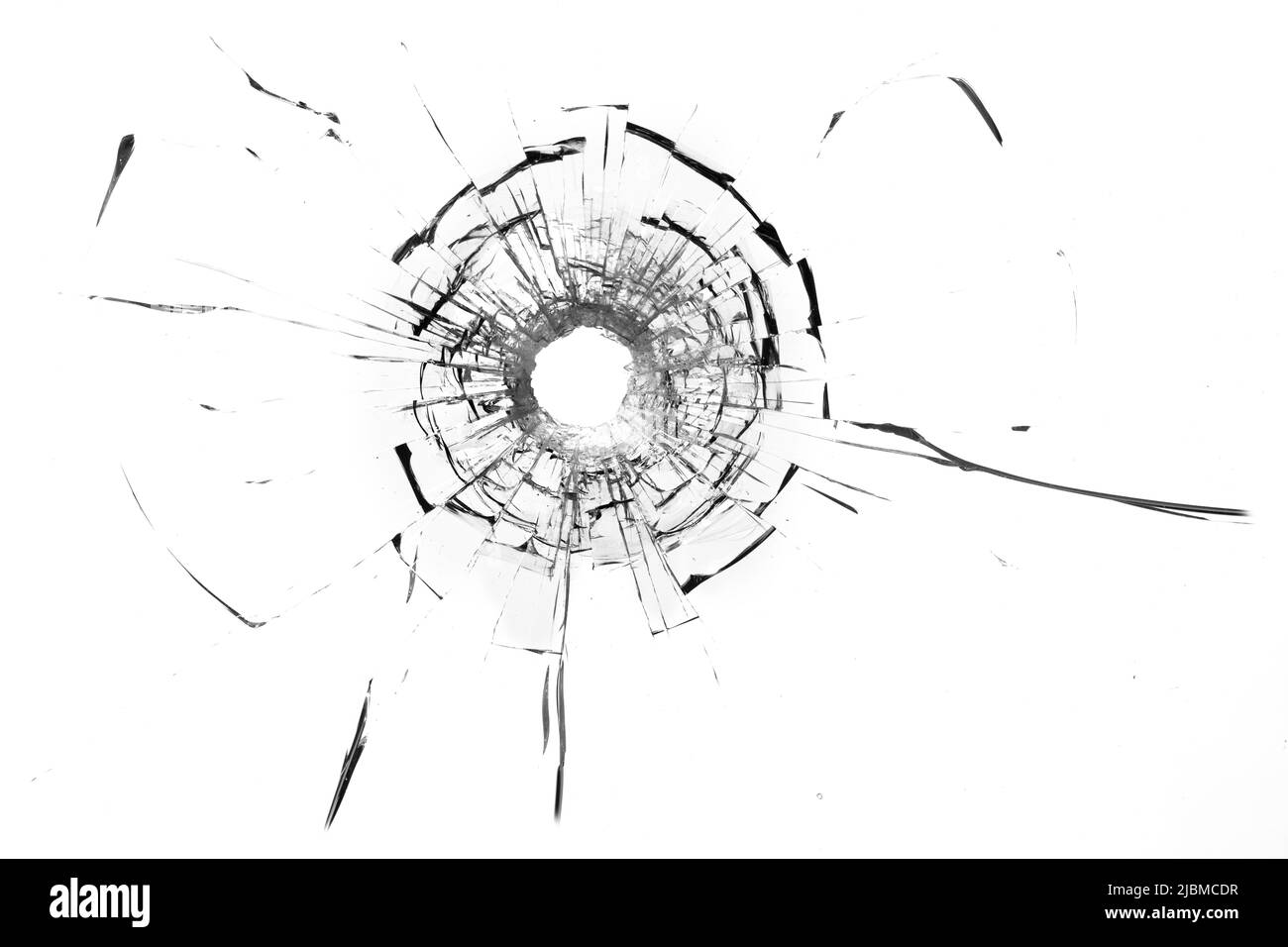 Trou de balle dans la roche. Fenêtre cassée, fissures. Arrière-plan ou texture abstrait Banque D'Images