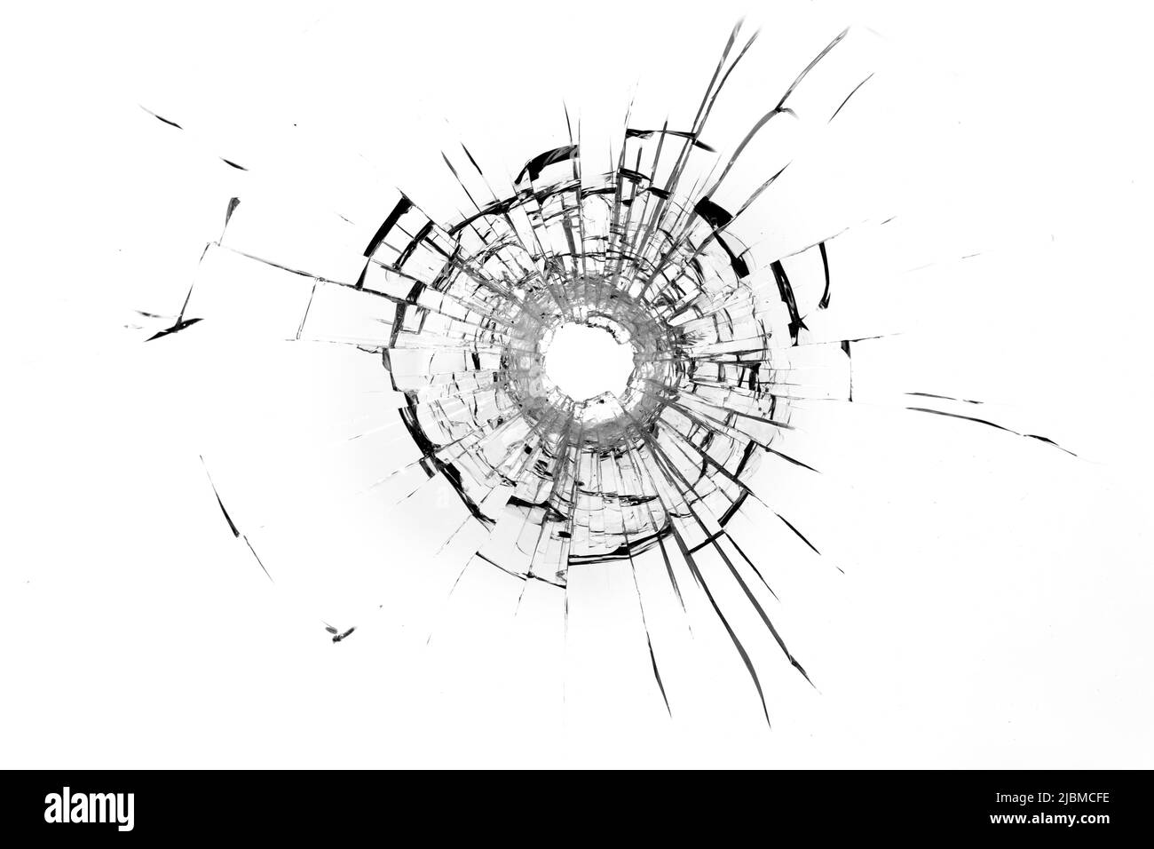 Trou de balle dans la roche. Fenêtre cassée, fissures. Arrière-plan ou texture abstrait Banque D'Images