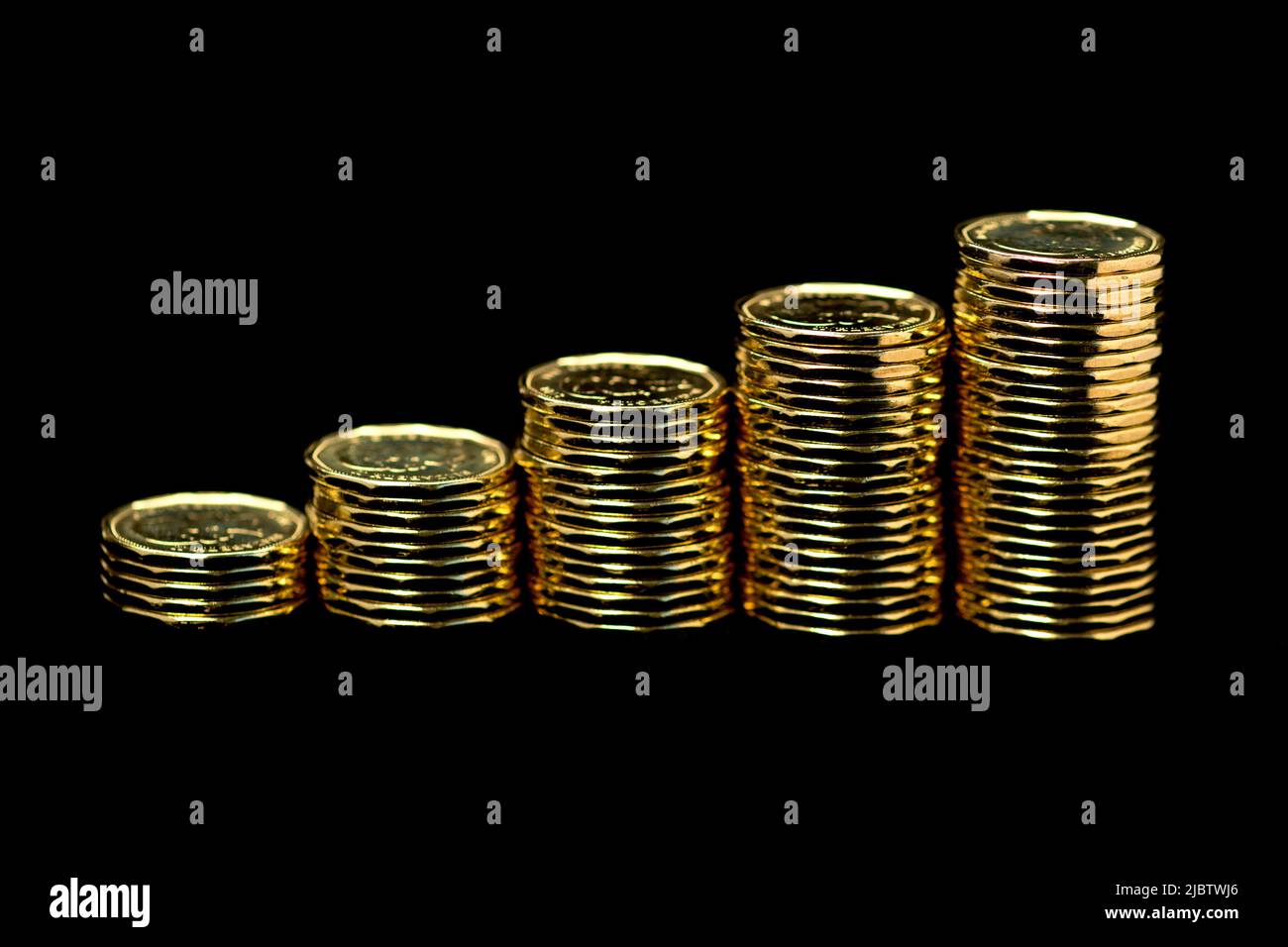 Pièces de monnaie canadiennes d'un dollar Loonie Cash Banque D'Images