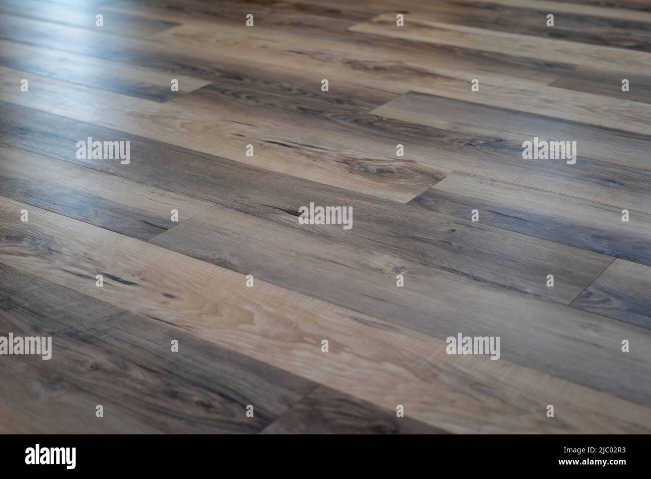 Revêtement de sol en vinyle de luxe avec aspect en bois dur texture naturelle pour l'arrière-plan. Banque D'Images
