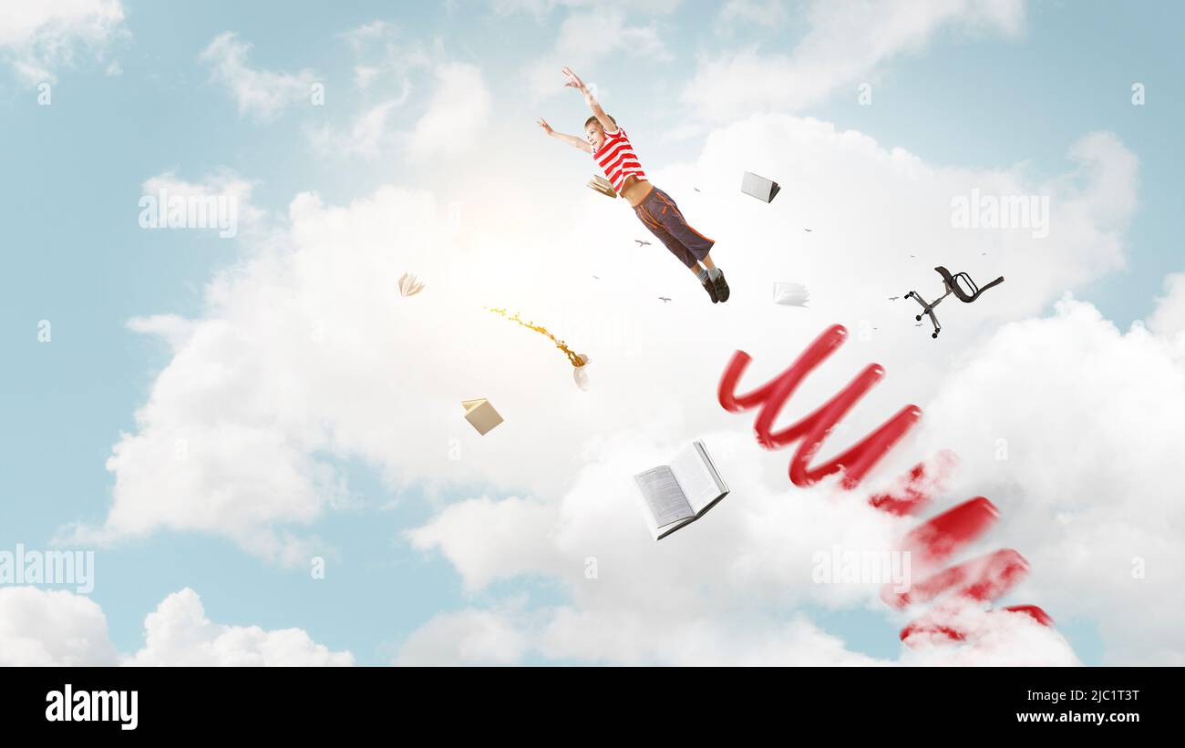 Les enfants sautent dans le ciel Banque D'Images