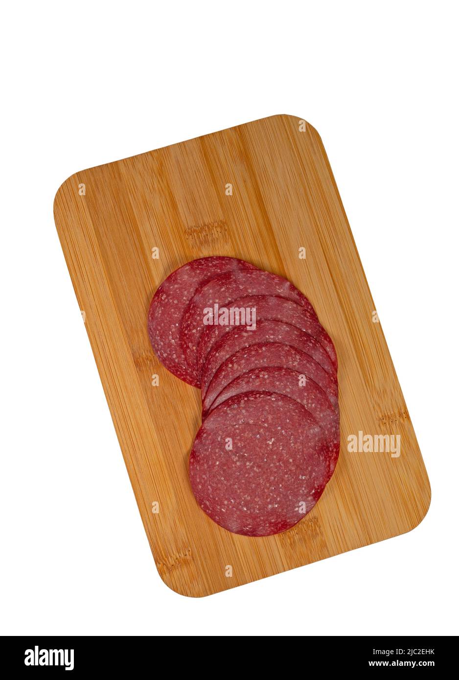 Tranché de salami sur une planche à découper Banque D'Images