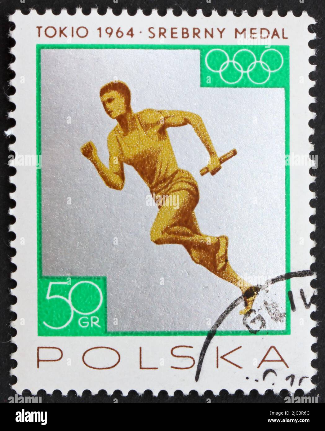 POLOGNE - VERS 1965 : un timbre imprimé en Pologne montre Relay Race, Men, médaille d'argent gagnée par l'équipe polonaise aux Jeux Olympiques de Tokyo en 1964, vers 1965 Banque D'Images