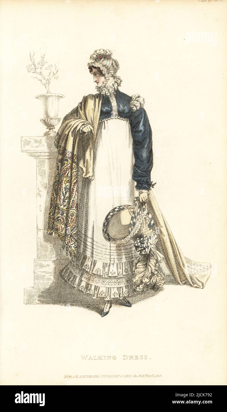 Régence dame en robe de marche tenant un capot français, 1818. Robe de masseline de jaconot, veste spencer au gros de Naples avec pattes aux épaules, casquette cornette en dentelle blanche, châle brodé. Conçu par Miss McDonald du 50 South Molton Street. 6, tôle 23, 1 octobre 1818. Gravure sur plaque de coperplate de couleur main par Thomas Uwins de Rudolph Ackermann's Repository of Arts, Strand, Londres. Banque D'Images