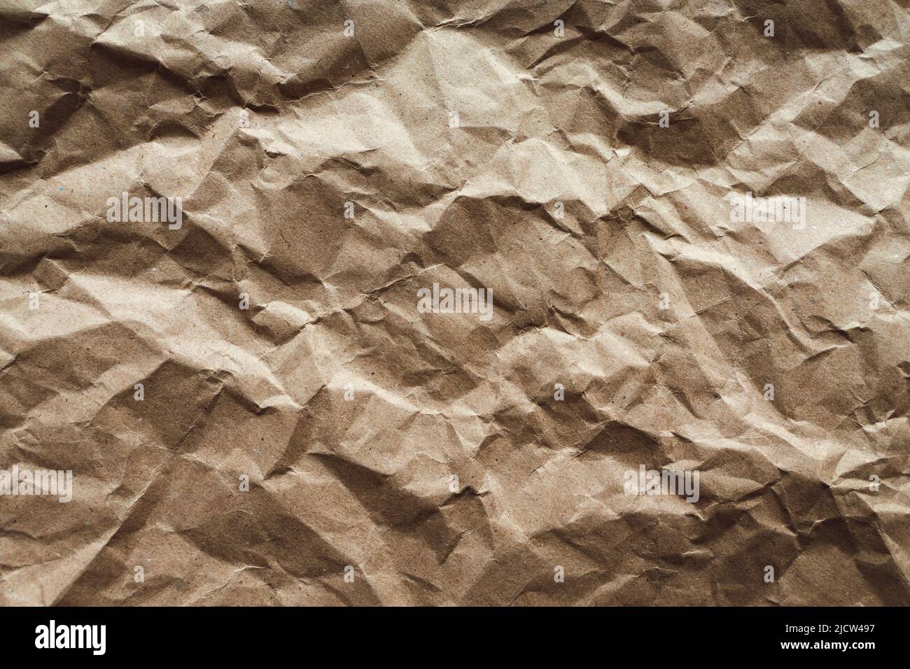 Texture de papier froissé, arrière-plan abstrait de papier recyclé brun Banque D'Images