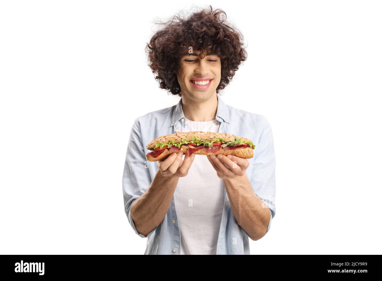 Happy guy holding sandwich looking Banque de photographies et d'images à  haute résolution - Alamy