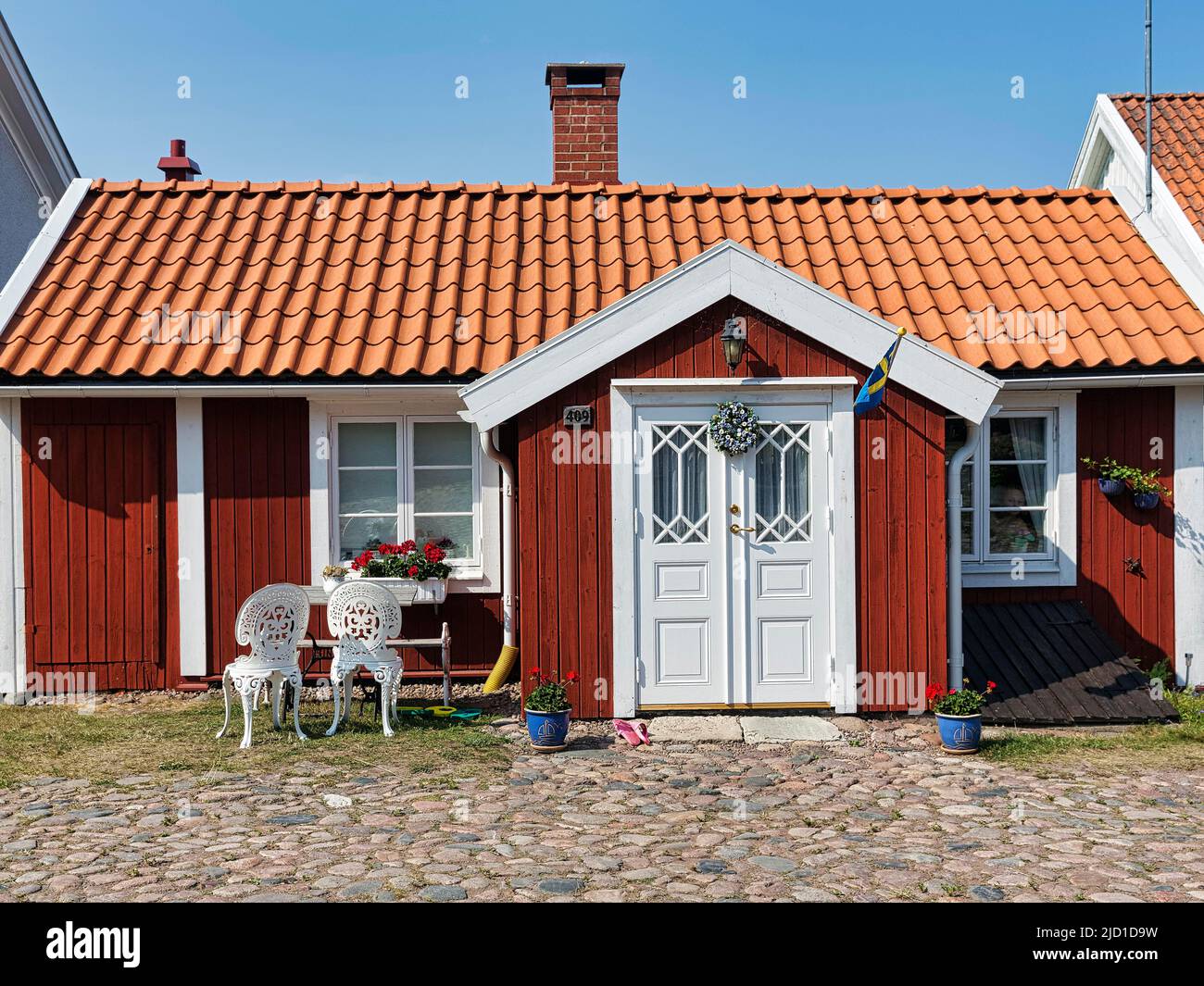 Maison suédoise ancienne typique, maison en bois rouge, Pataholm, Moensteras, Kalmarsund, Smaland, Suède Banque D'Images