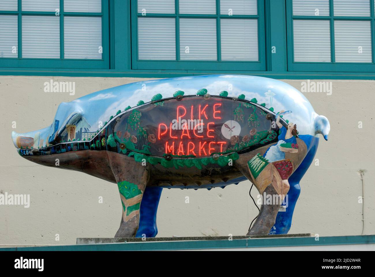 Un cochon modèle fait la promotion du marché historique de Pike place. Banque D'Images